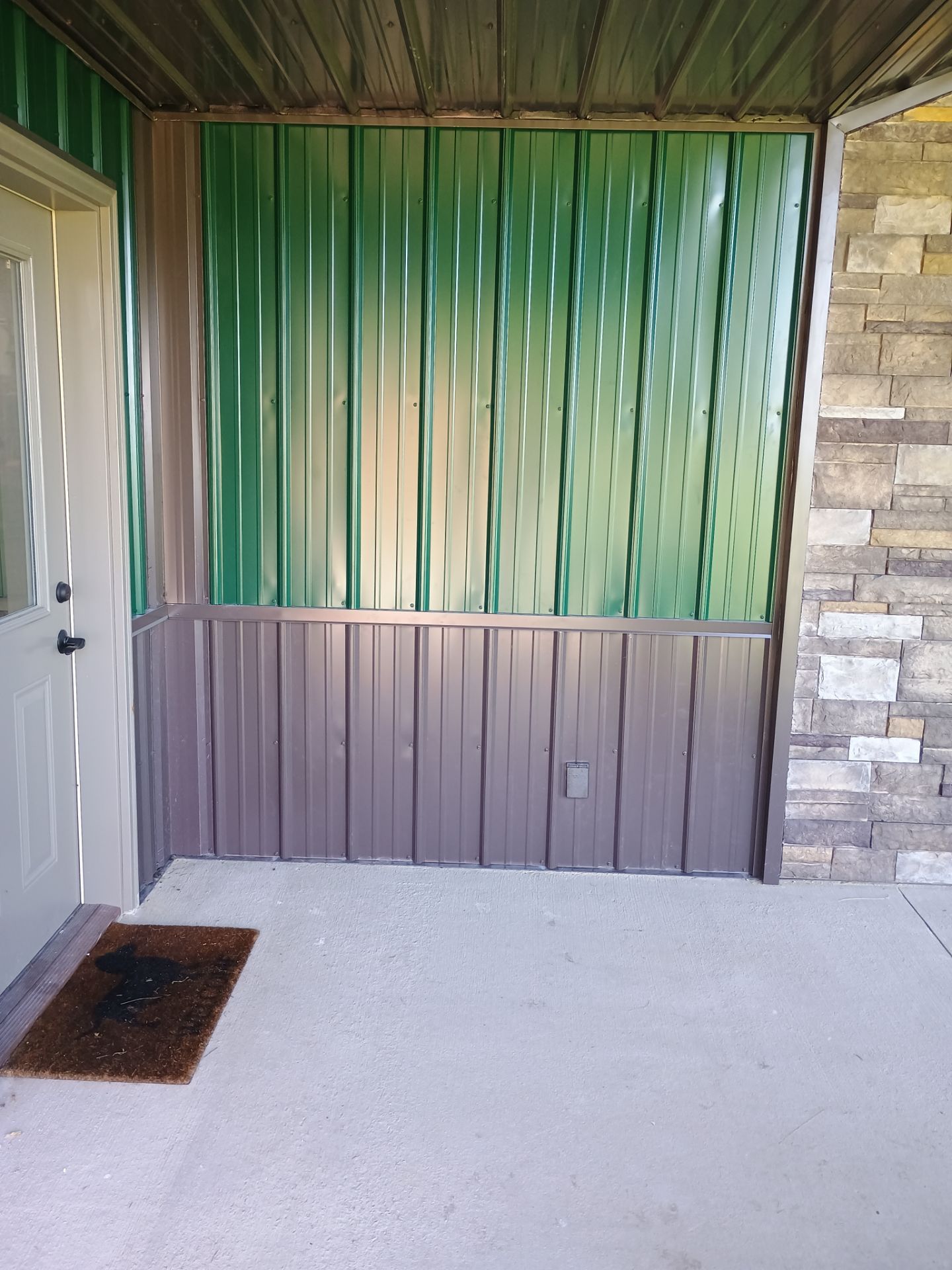 Siding Installation using Platinum AG Panel Burnished Slate  by Nitro Roofing and Construction