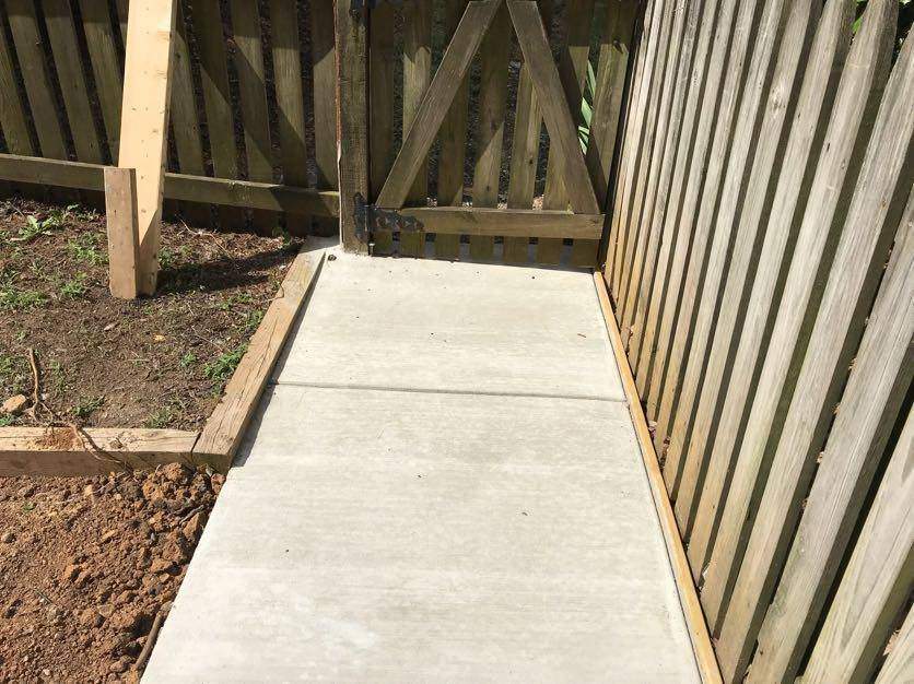 Exterior Repair using Concrete Pad/ walkway by Alpha Design Services