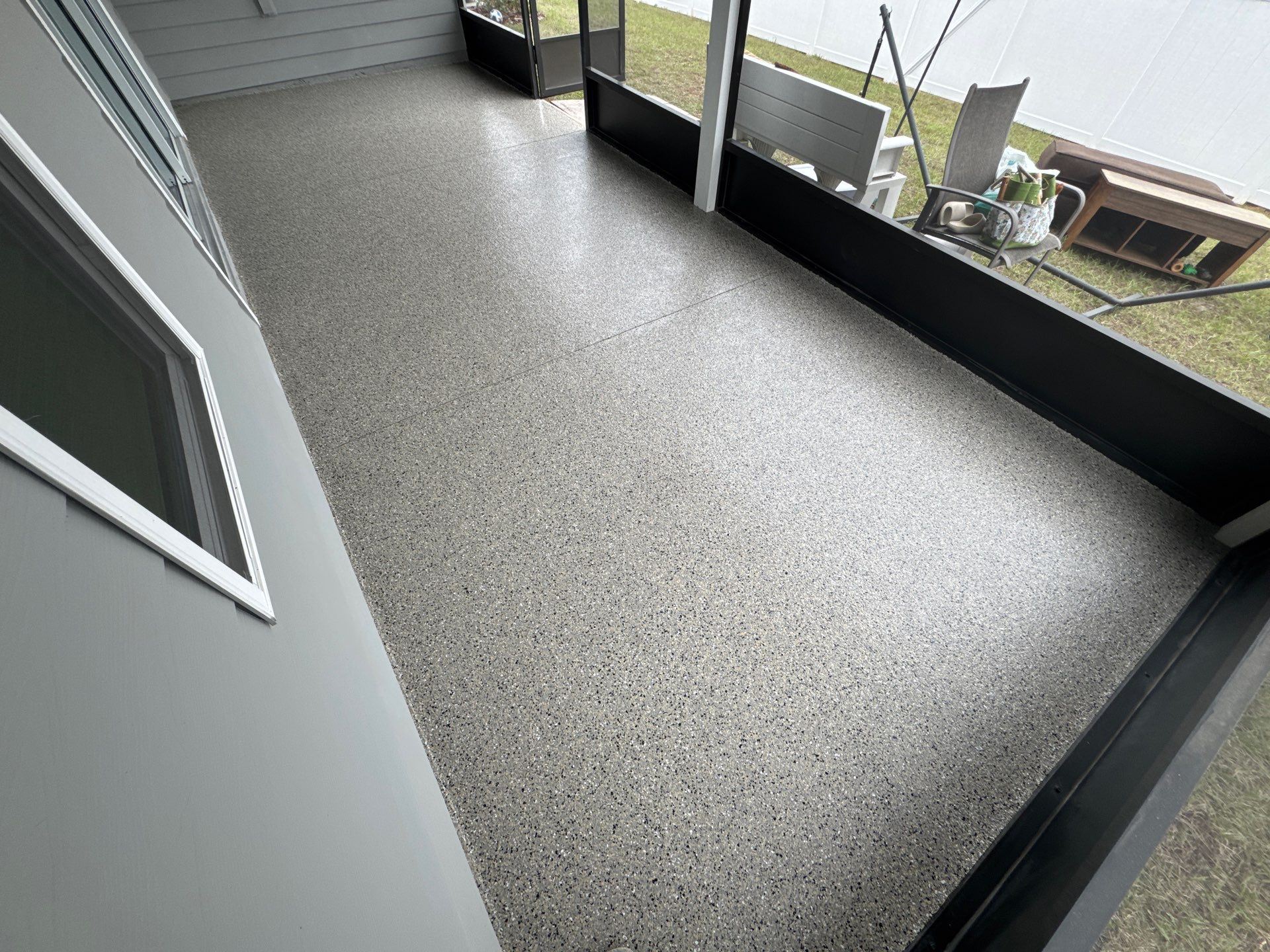 Back Porch in Mediterranean  by Cross Creek Concrete Coatings