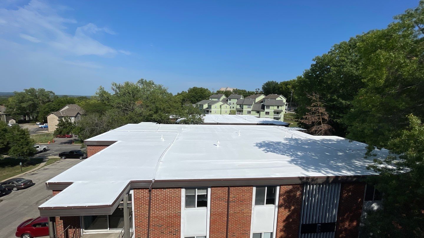 Commercial Flat Roofing System - PVC Membrane & Fluid Applied Coatings  by Titan Commercial & Residential Roofing 