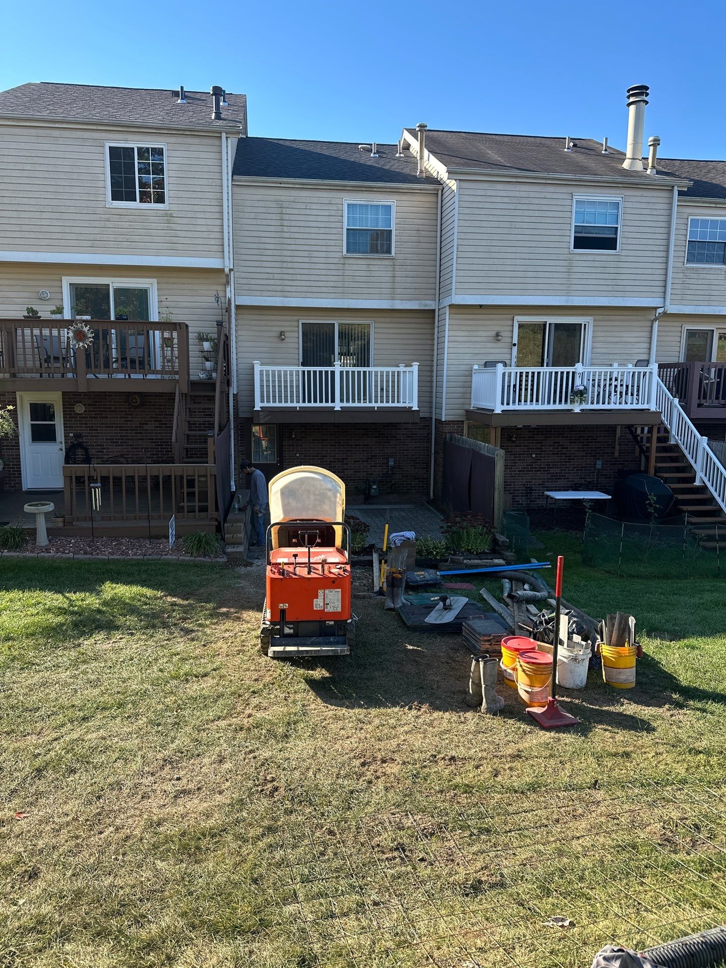 Stamped concrete and redeck  by Cousins Roofing Siding & Decks