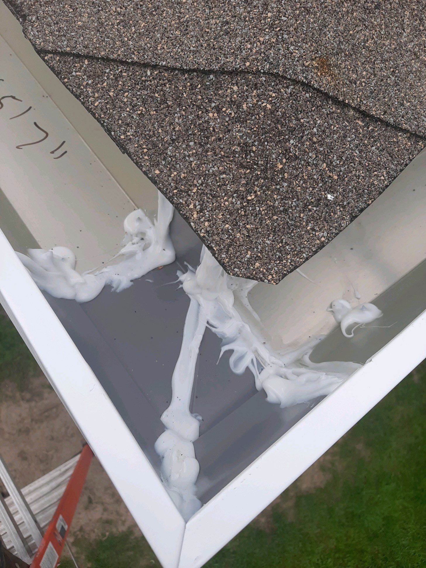 Gutter Installation Using White K-Style Seamless Gutters by Gutter Professors