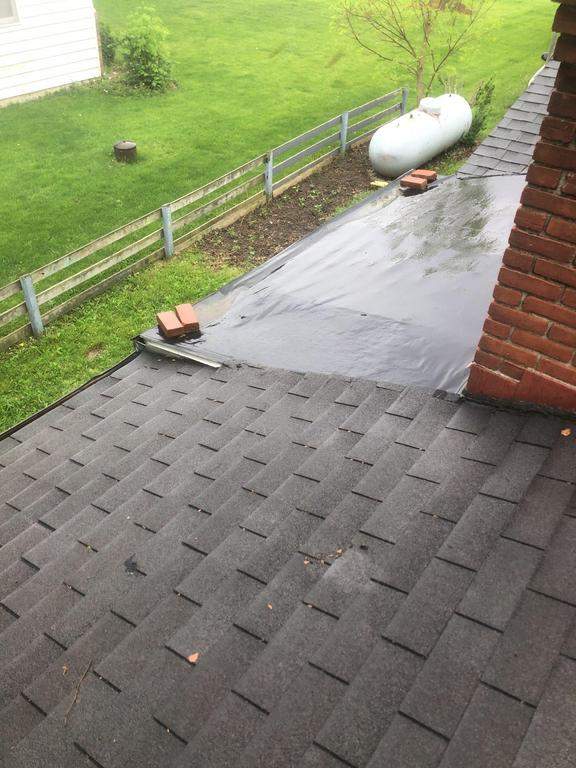 Residential Roofing Installation using 60 mil rubber roof  by Nitro Roofing and Construction