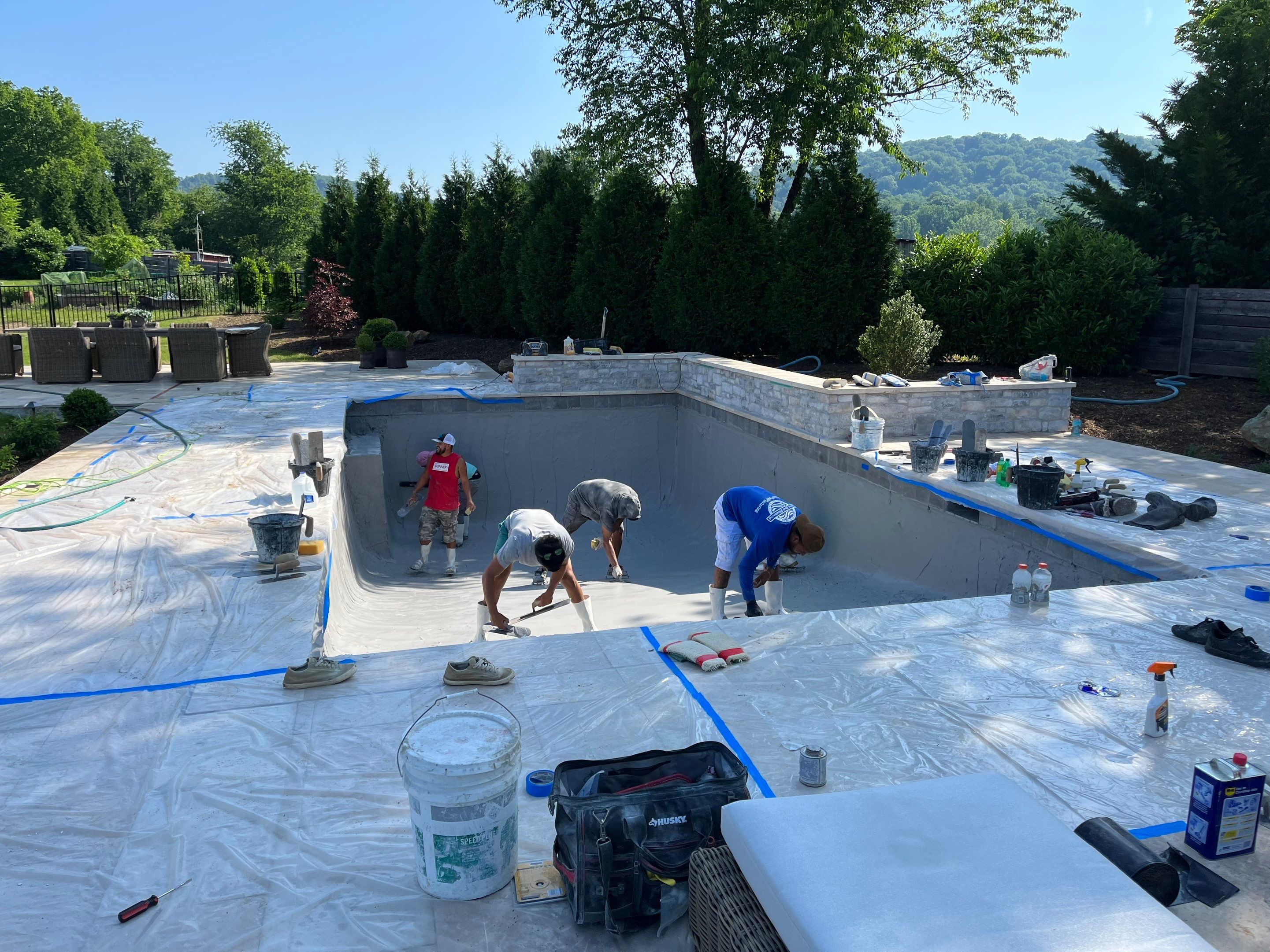 Gunite Pool w/ Raised Wall and Waterfalls by Elysium Pools