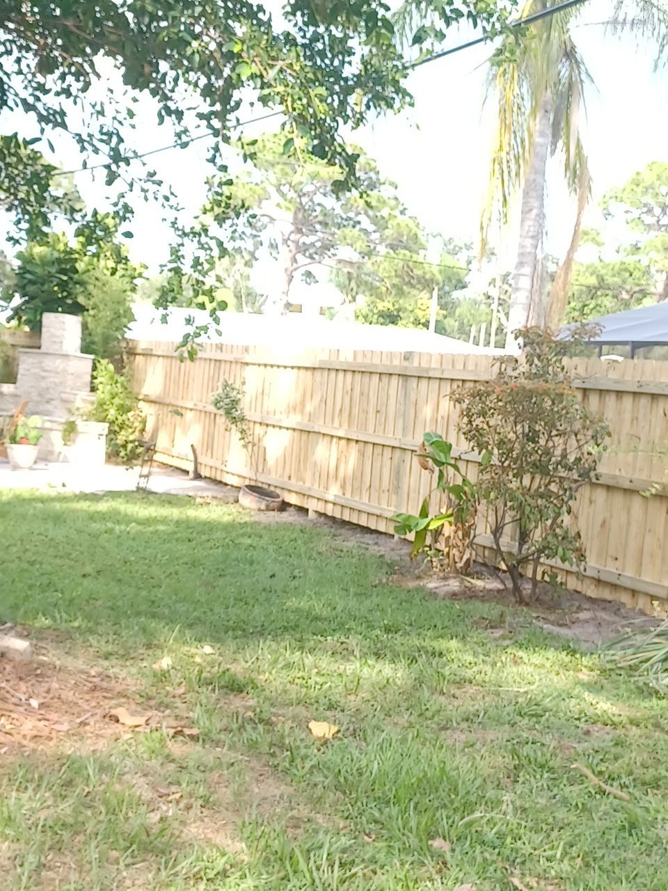 Sarasota, FL 6ft. Tall Treated Board on Board Wood Fence by Asap fence and gates, LLC
