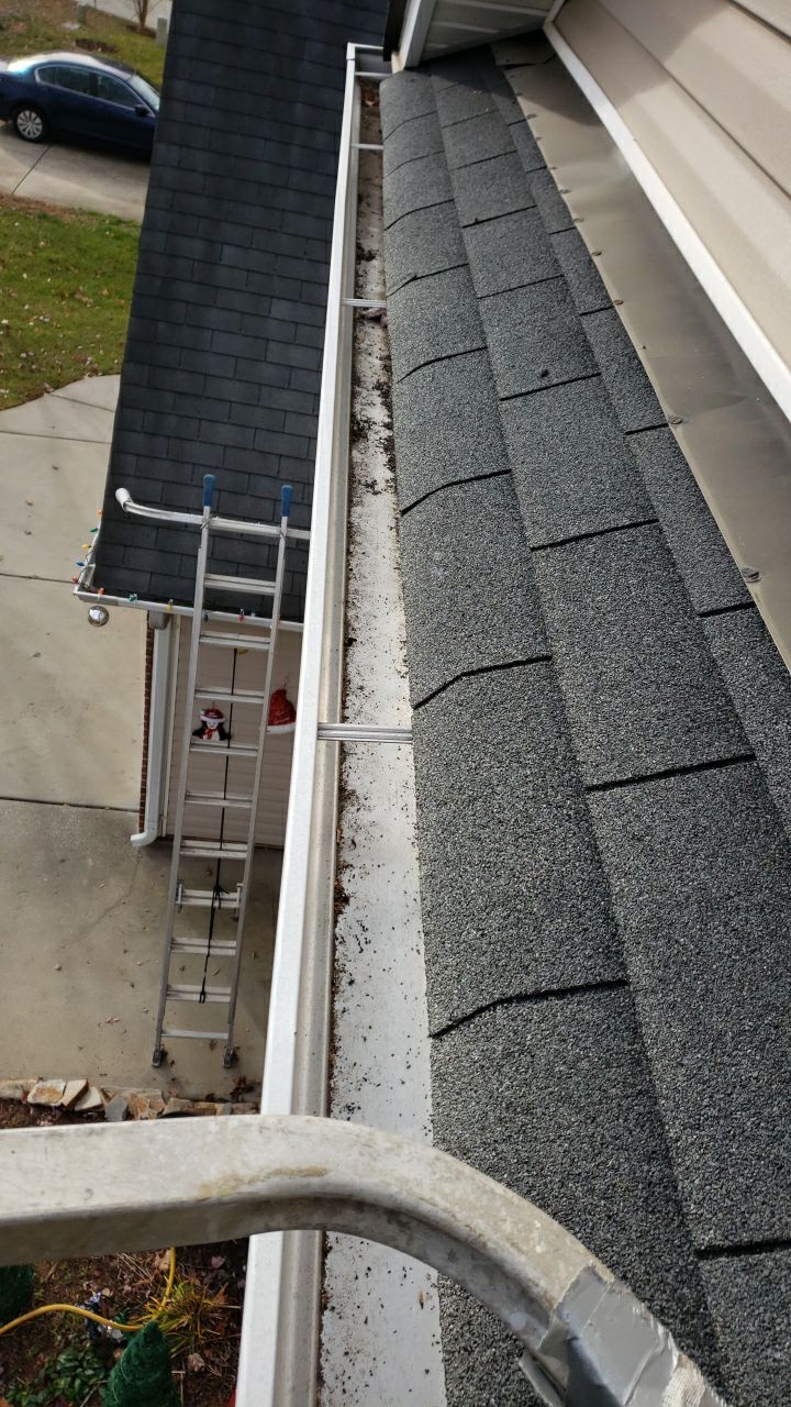 gutters and Driveway by Power Wash Masters LLC