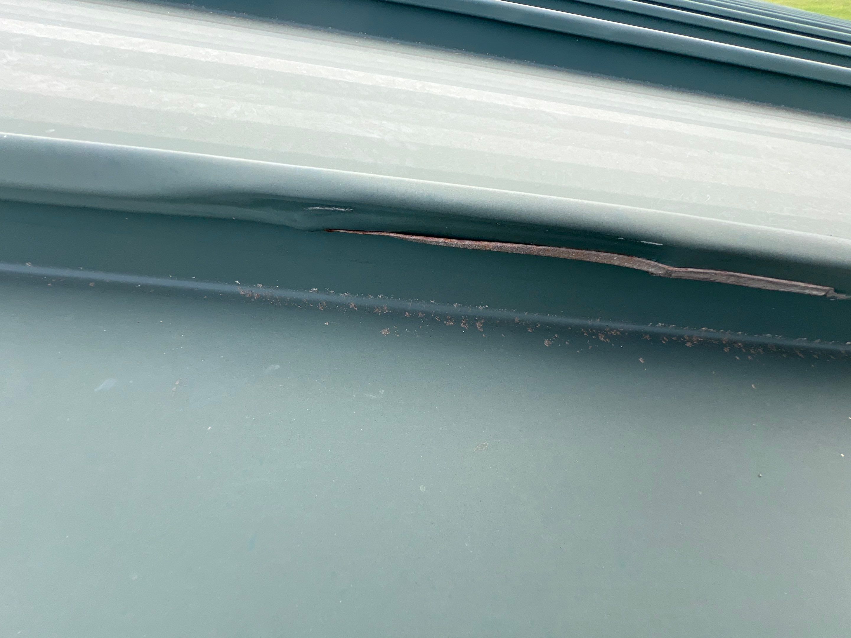 Hail Damage using Metal by Roof Repair Company