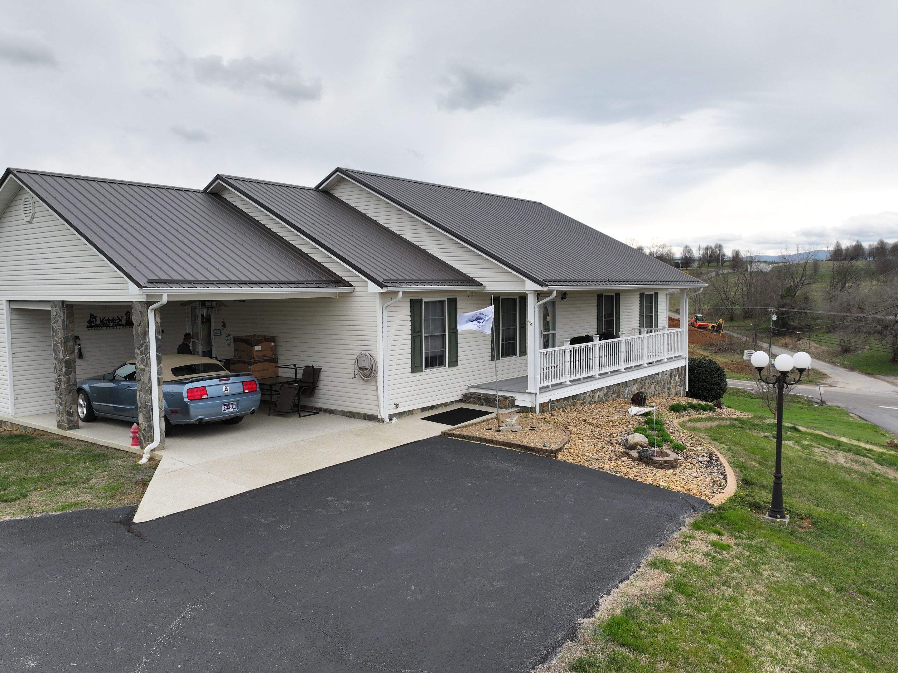 Lutackas Residence by Omnia Roofing