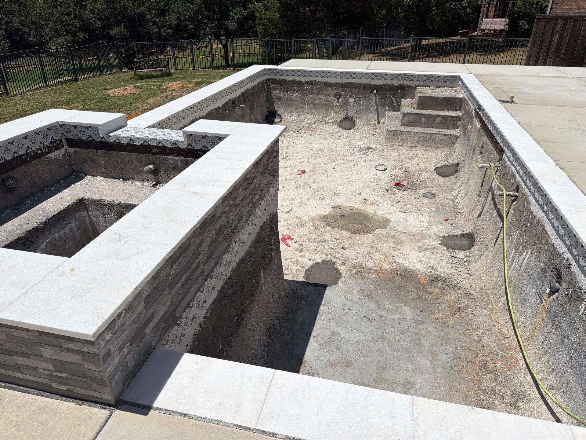 Geometric Pool with Raised Spa and Sun Shelf by Pinnacle Pools and Spas - DFW