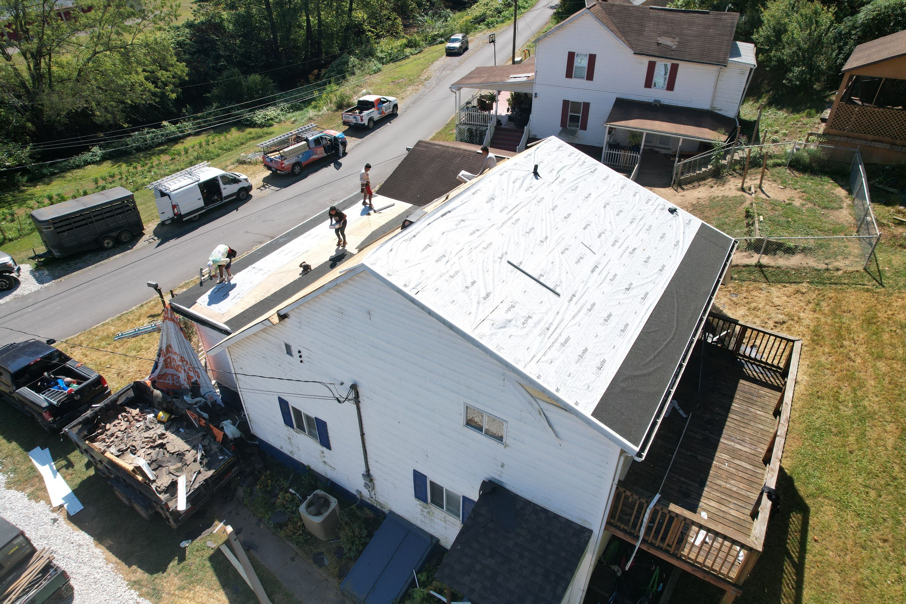 Residential Roofing Installation using GAF Timberline HDZ Biscayne Blue by Rainstoppers Roofing
