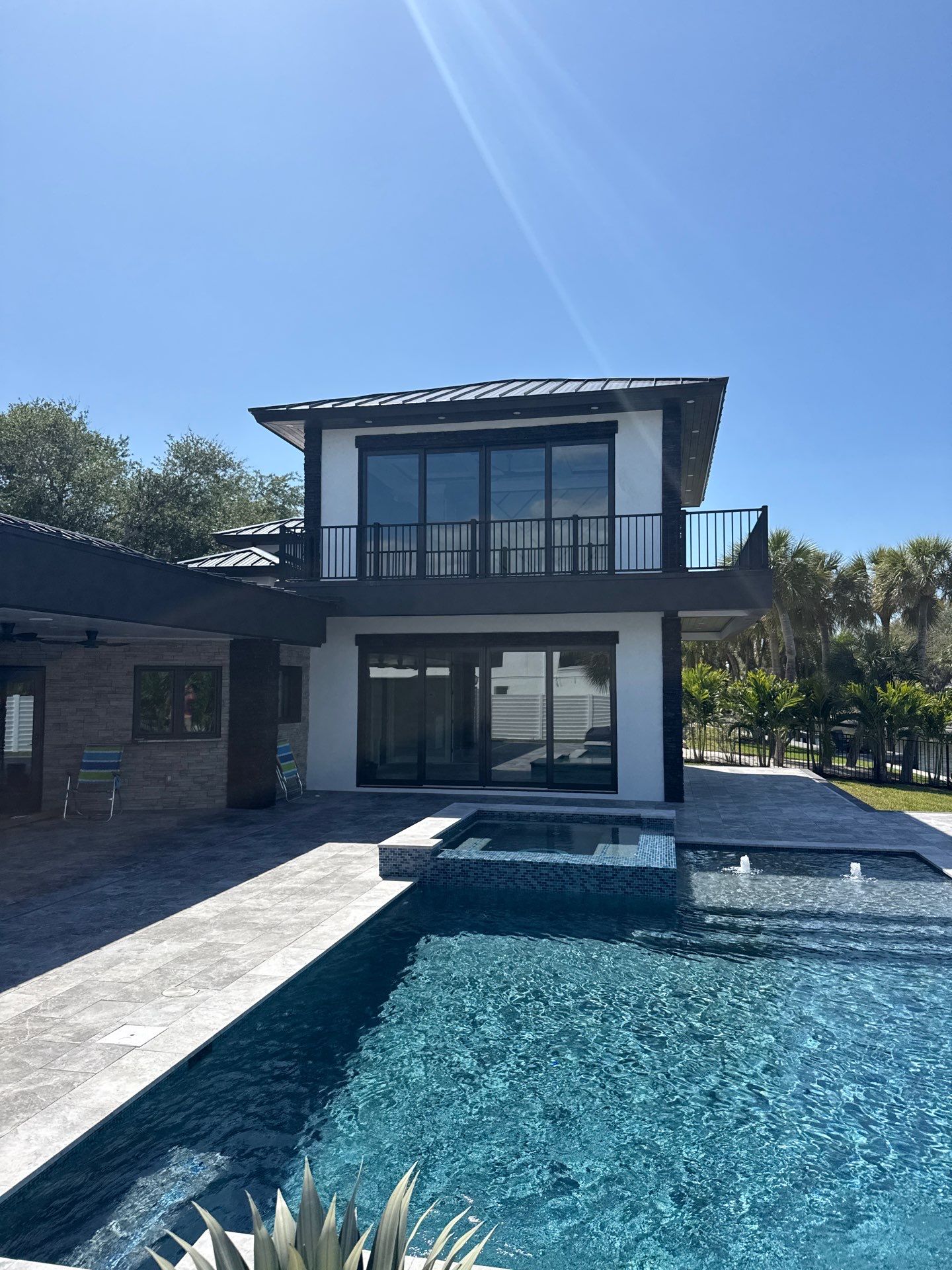 7-Inch Smooth Box Seamless Gutters using black seamless gutters in Siesta Key Fl by Gutter Professors