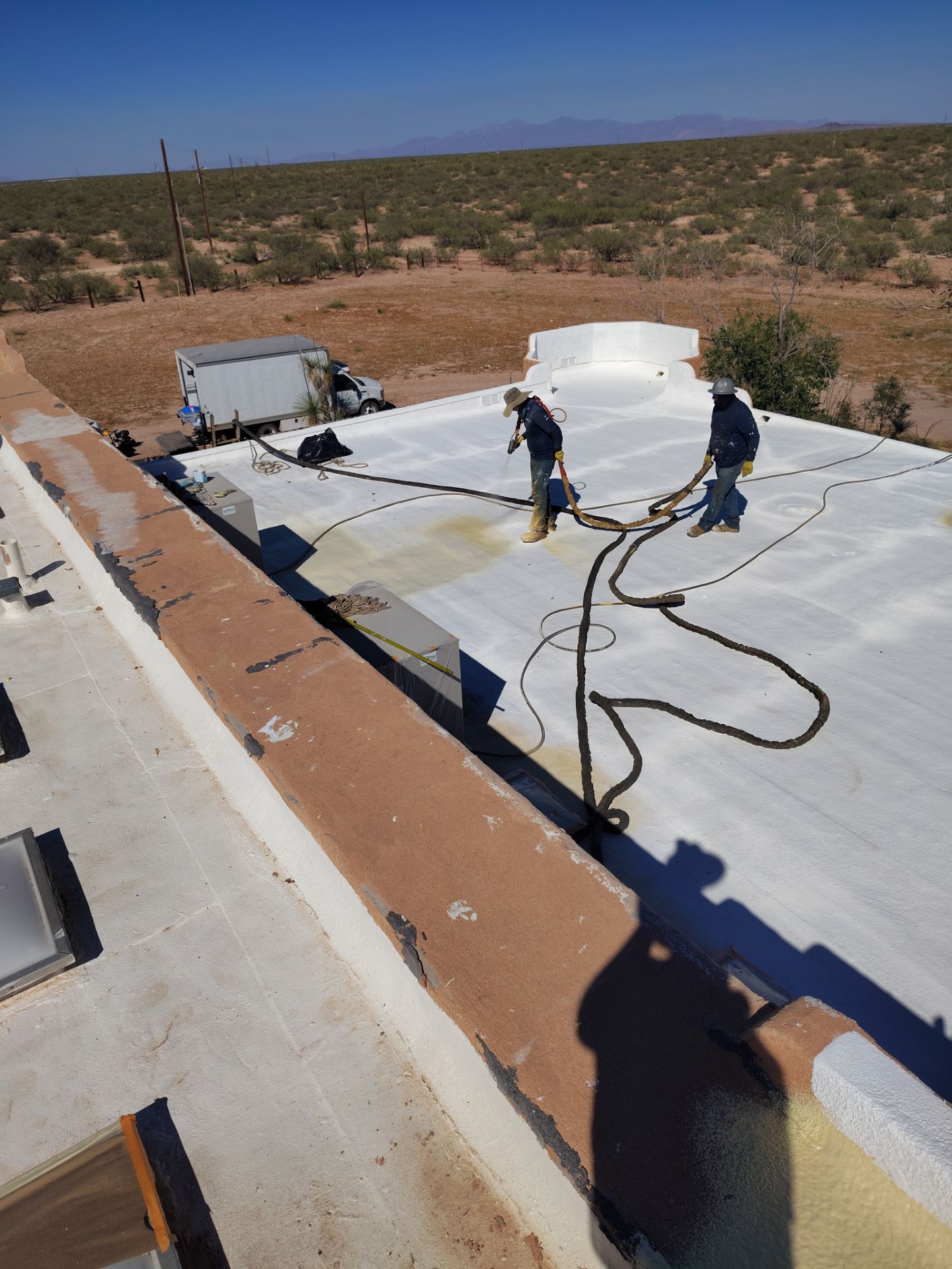 Residential roof application by SPF Services 