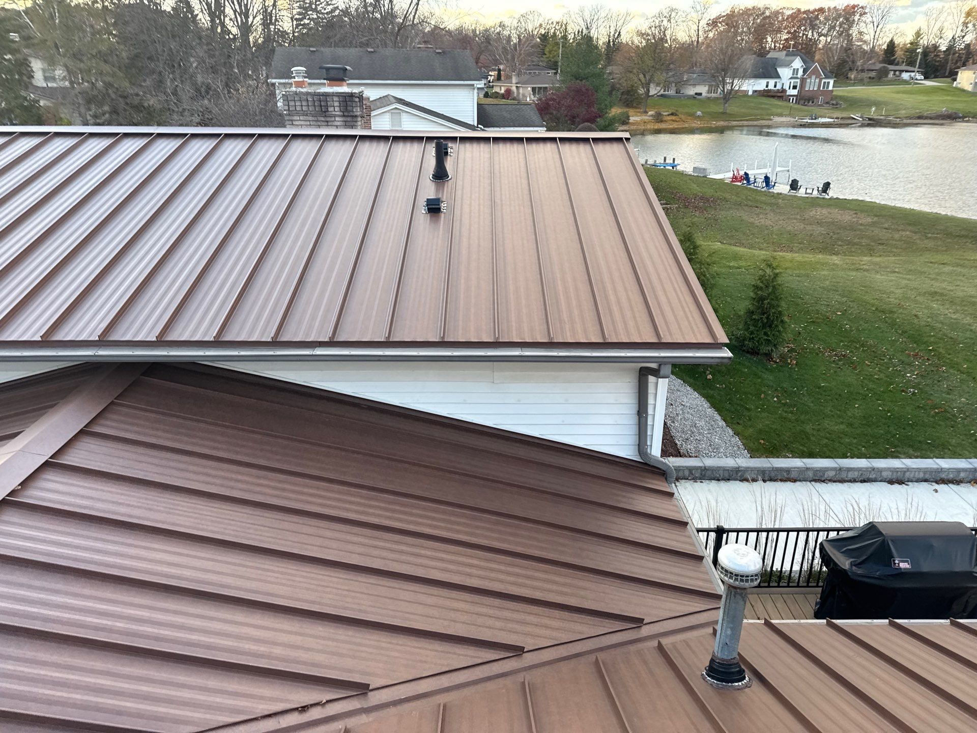 Roof Replacement using MS Standing Seam Roof Western Rust by 180 Contractors