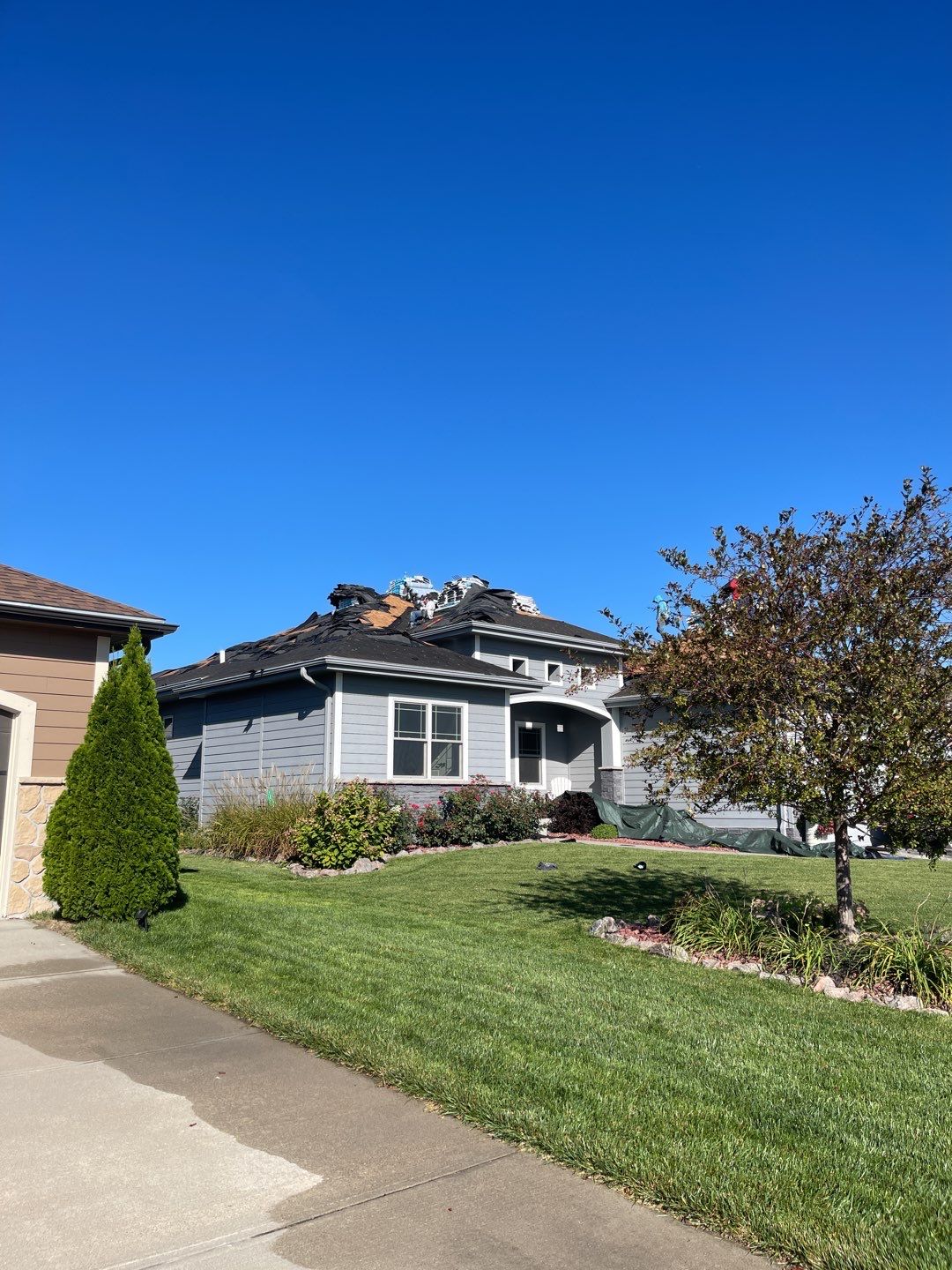 Residential Roofing Installation using IKO Dynasty Granite Black by Lightning Exteriors