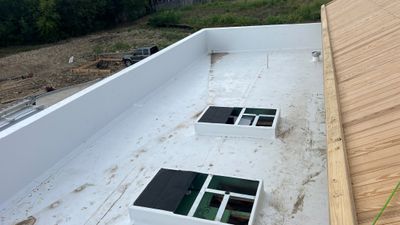 Commercial Roofing Installation using Versico TPO for Justin's Nest Non-Profit