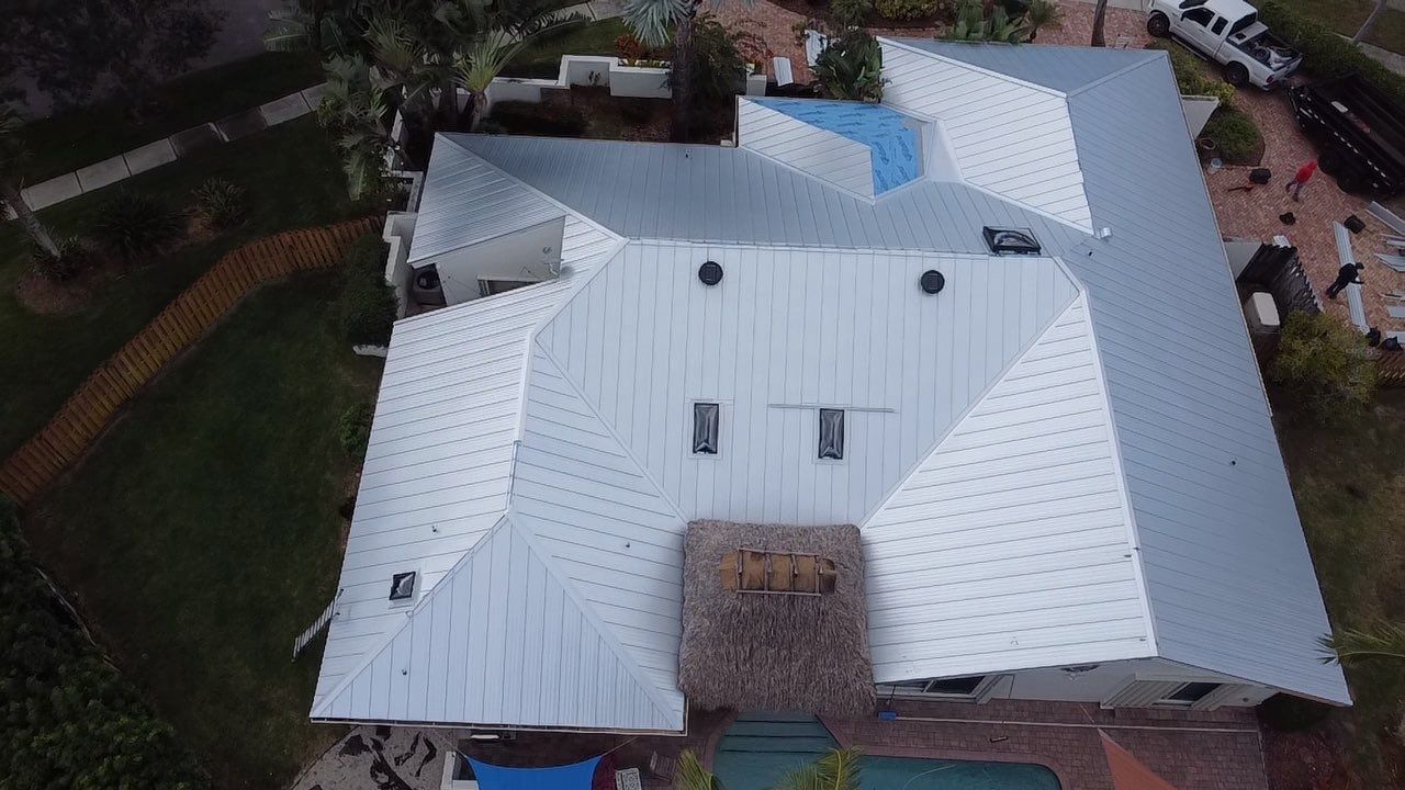 Residential Roofing Installation using 1" Nail strip metal roof by BLUES BROTHERS ROOFING