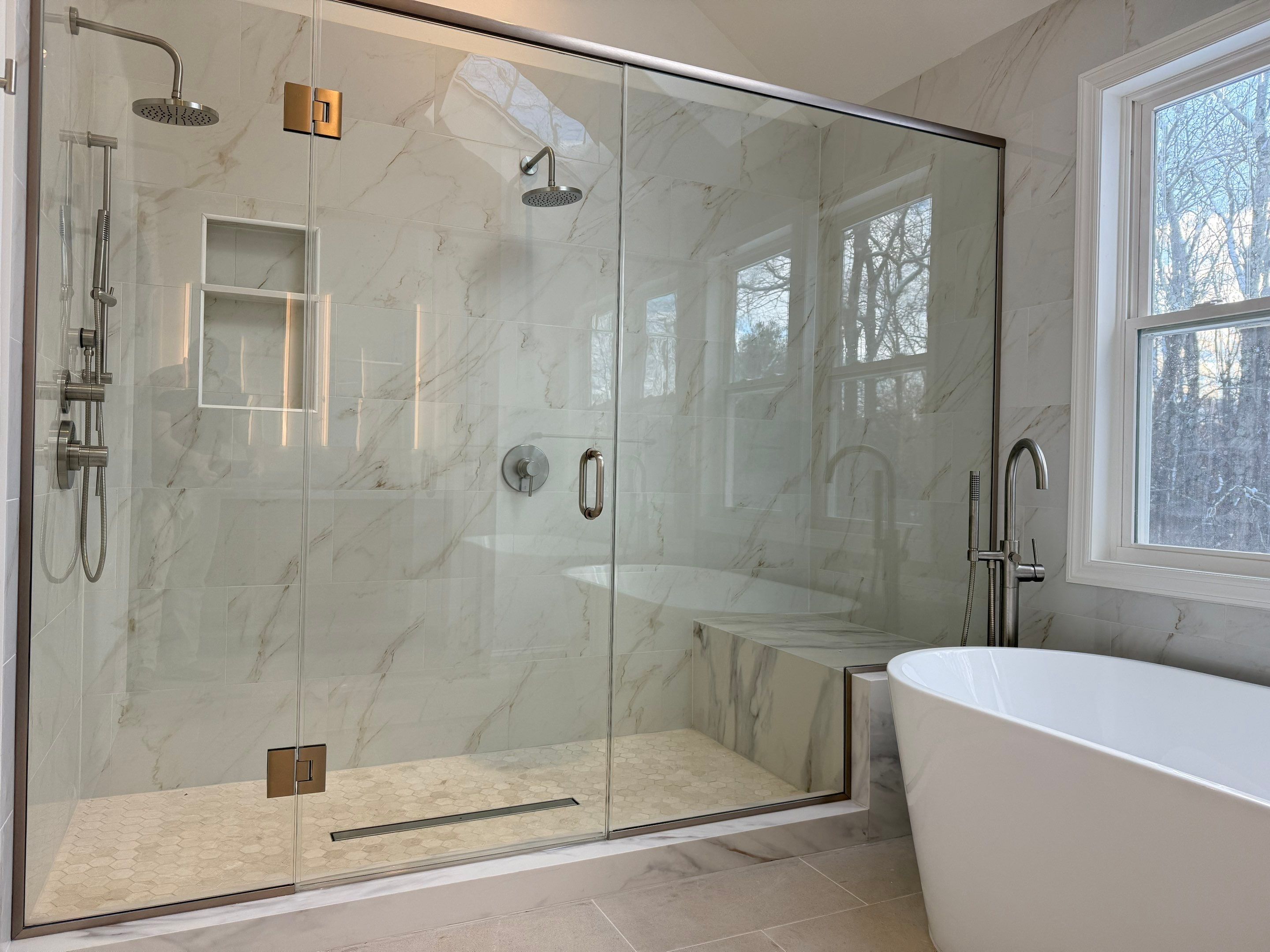 Bathroom Remodel using Tile by Home Concepts Construction