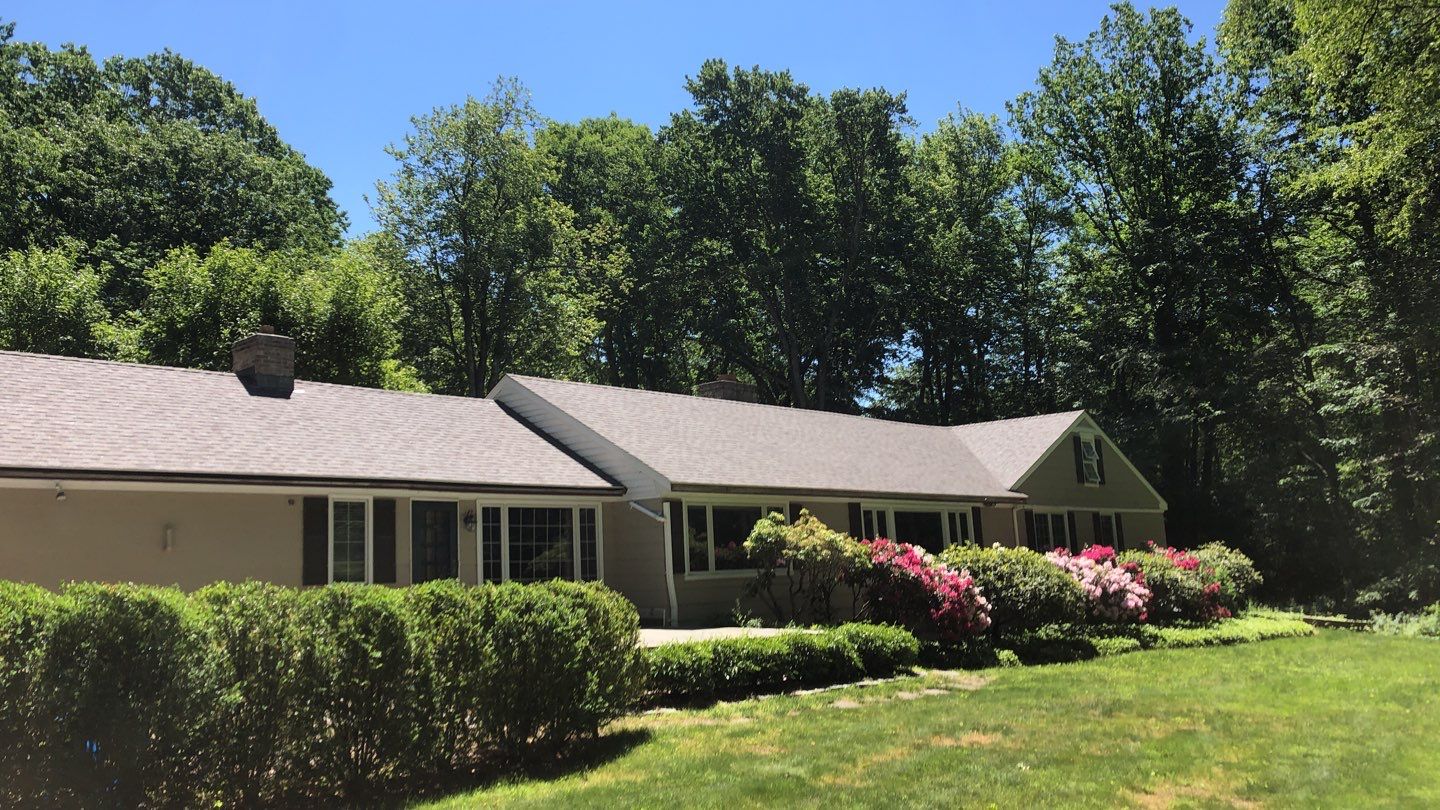 Commercial Roofing Installation using Owens Corning Duration Driftwood by A Plus Exterior
