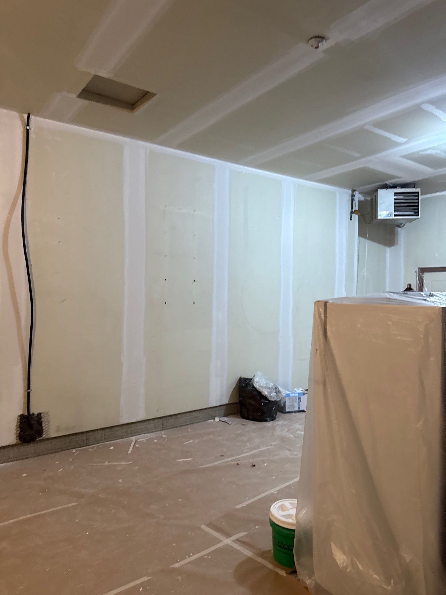 Residential Garage Interior Painting and Drywall Repair in Tea by Select Painting, Coatings & Garage Cabinets