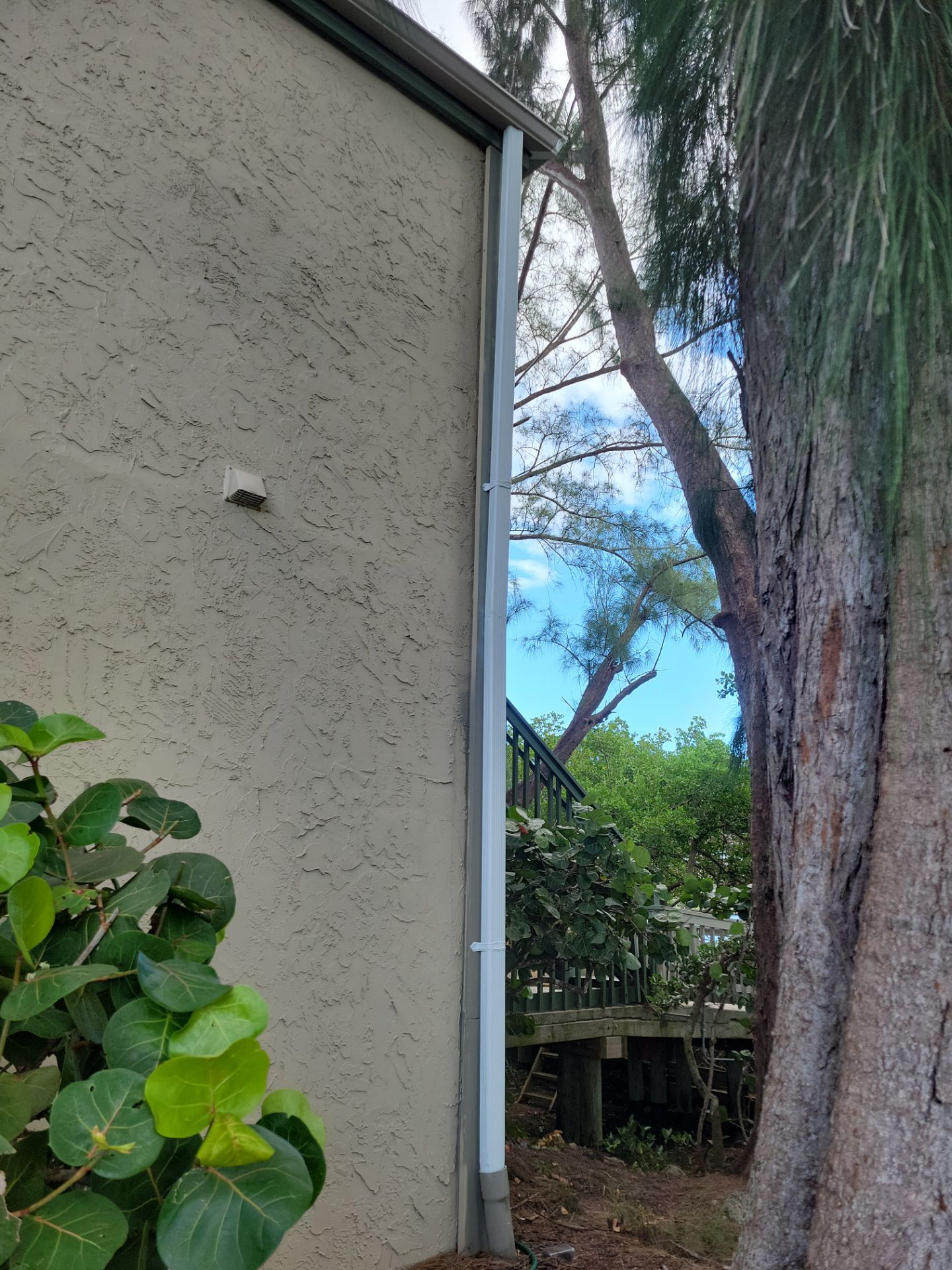 White Gutters Repair and Installation in Sarasota FL by Gutter Professors