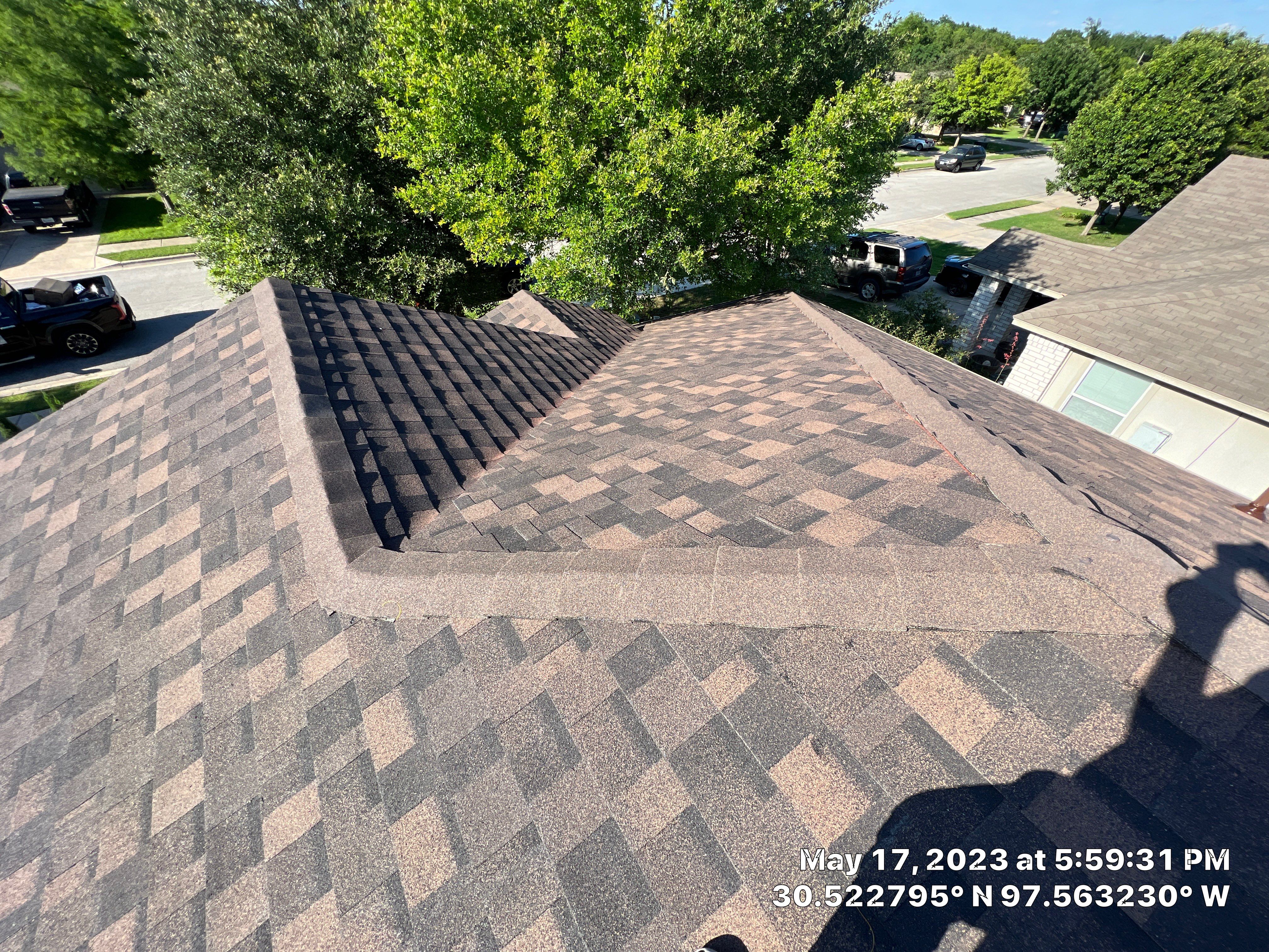 Residential Roof Replacement and Gutter System Upgrade in Hutto by Caliber Restoration LLC