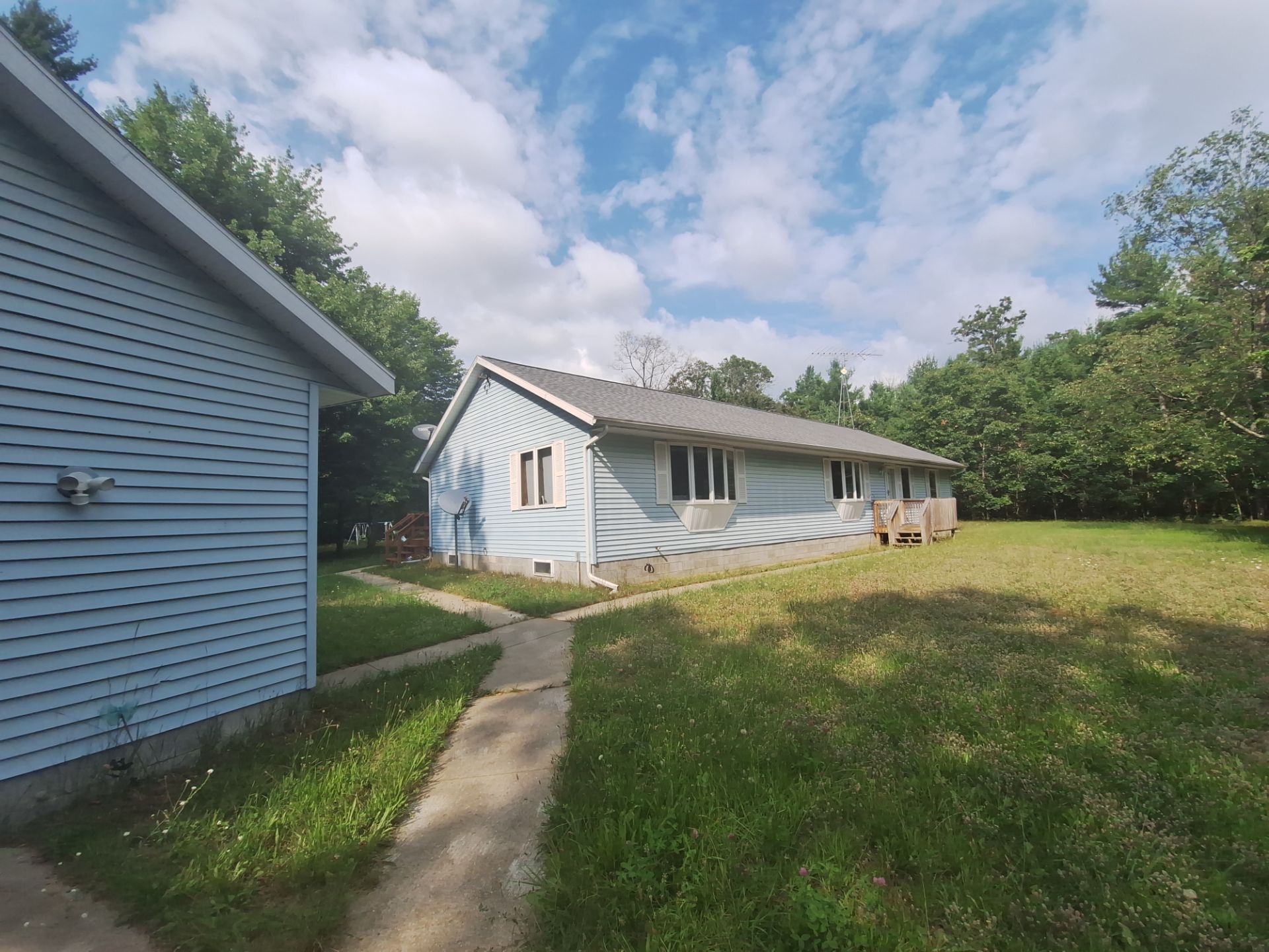 Deck staining and exterior foundation painting! by Gordon Painting