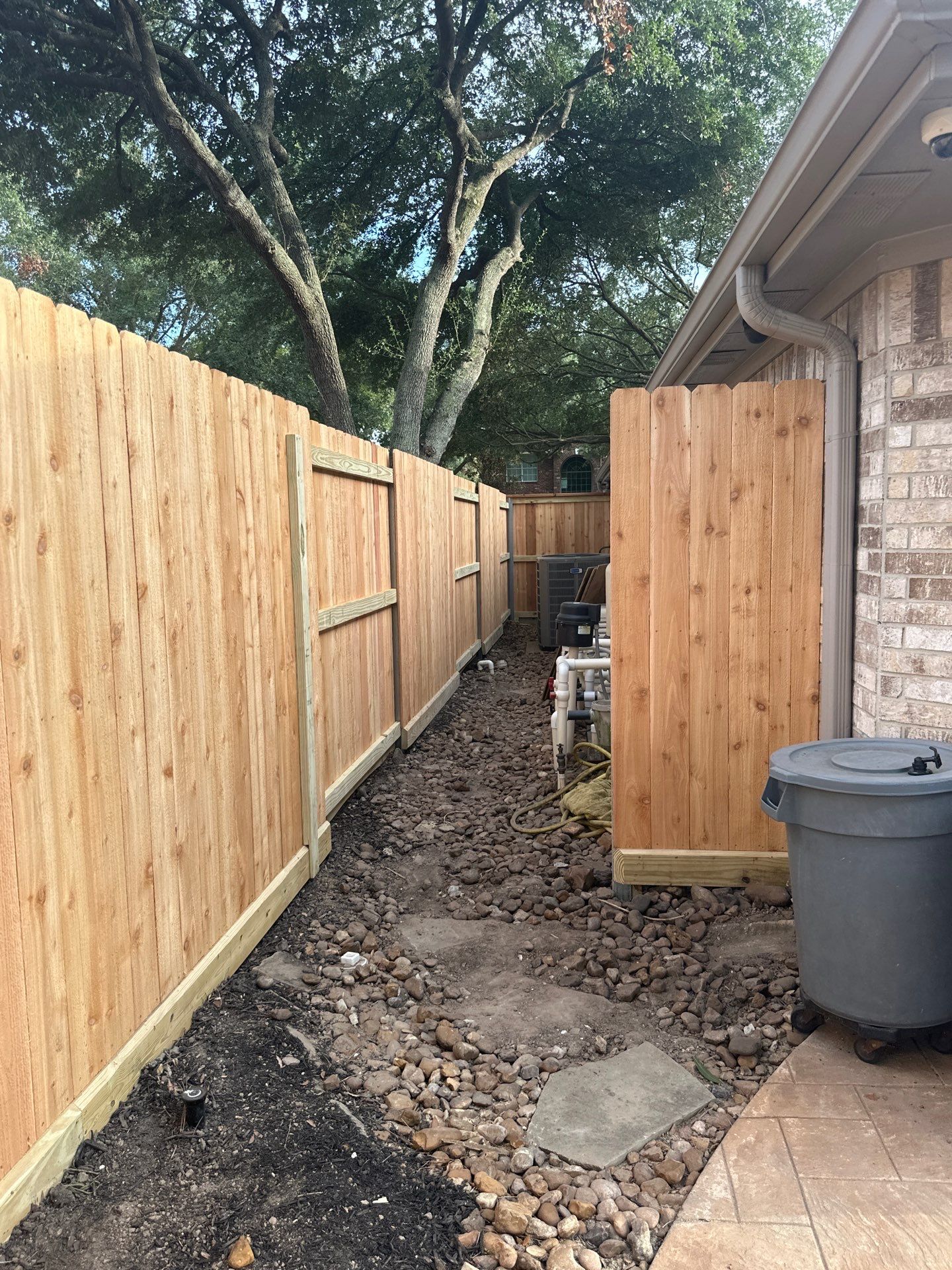 Wood fence project in Cypress by Tim's Fences