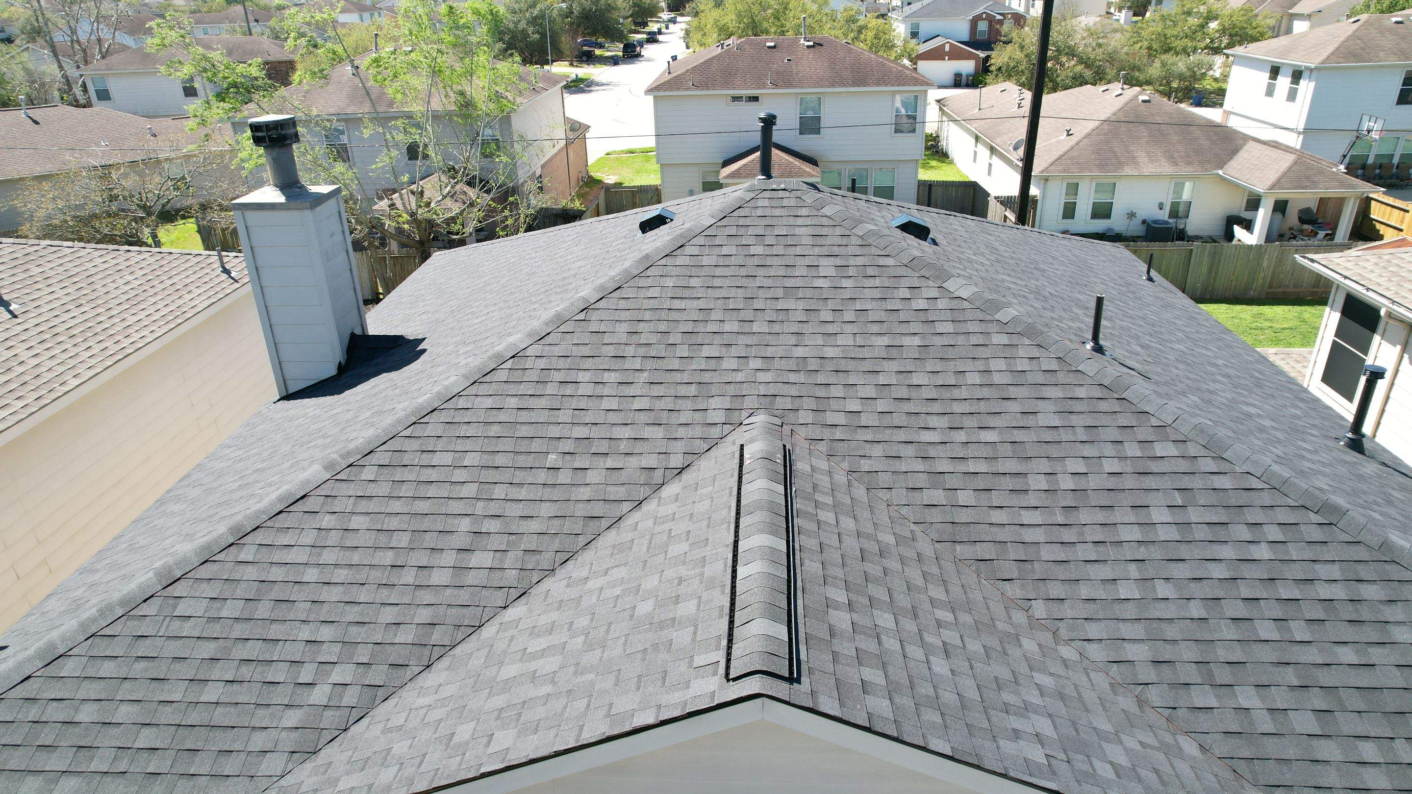 Complete Charcoal-Gray Roof Replacement — Spring, TX by PL Roofing & SB Roofing, LLC.
