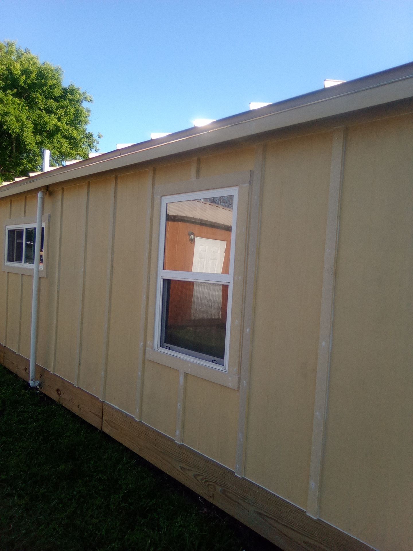 Vinyl to Hardie by Bayfront Roofing and Construction