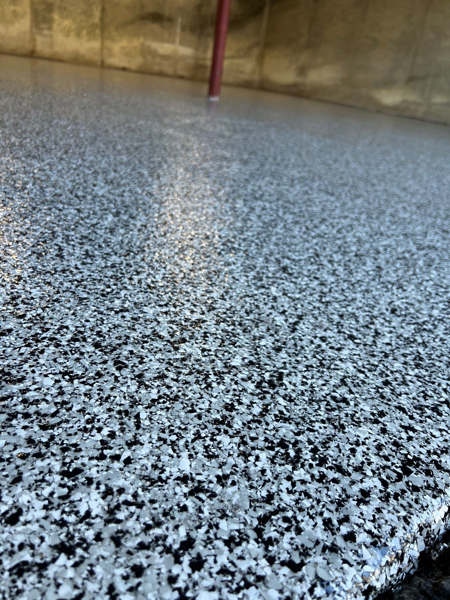 Garage in Londonderry, NH 03053 by Symphony Concrete Coatings