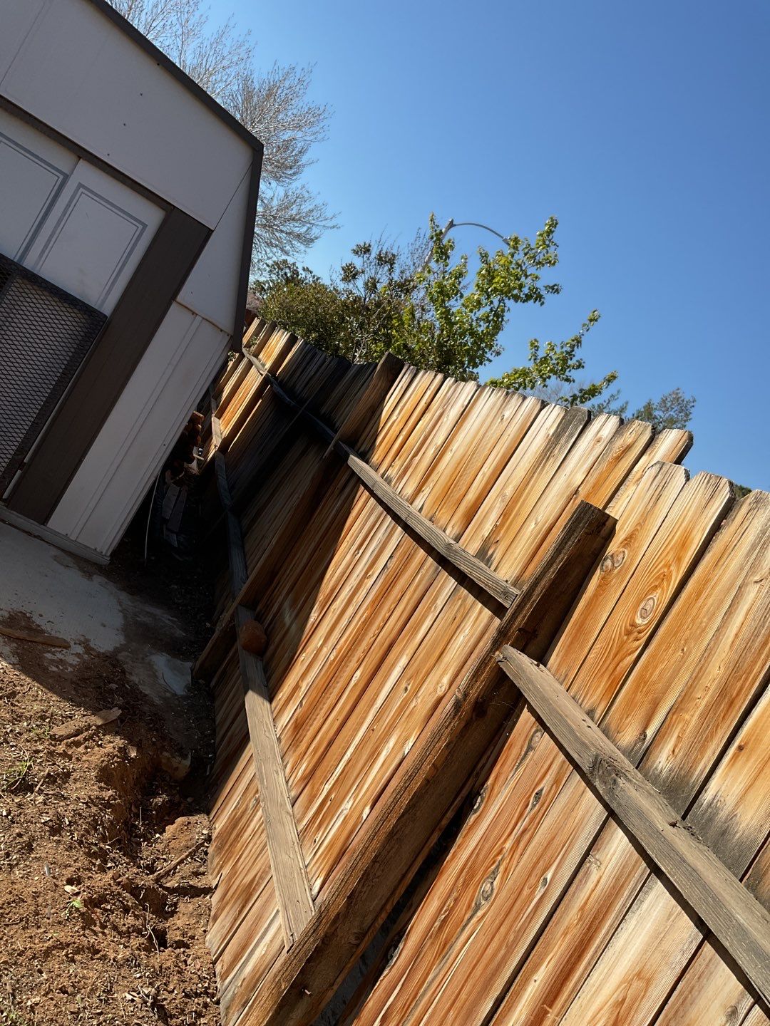 Fence installation using vinyl material by Fence Guys Inc. 