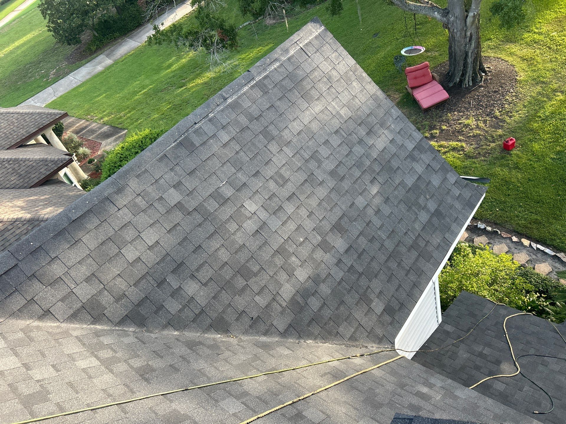 Residential Roofing Installation with Black Shadow Shingles in Clermont by Pinnacle Roofing Group