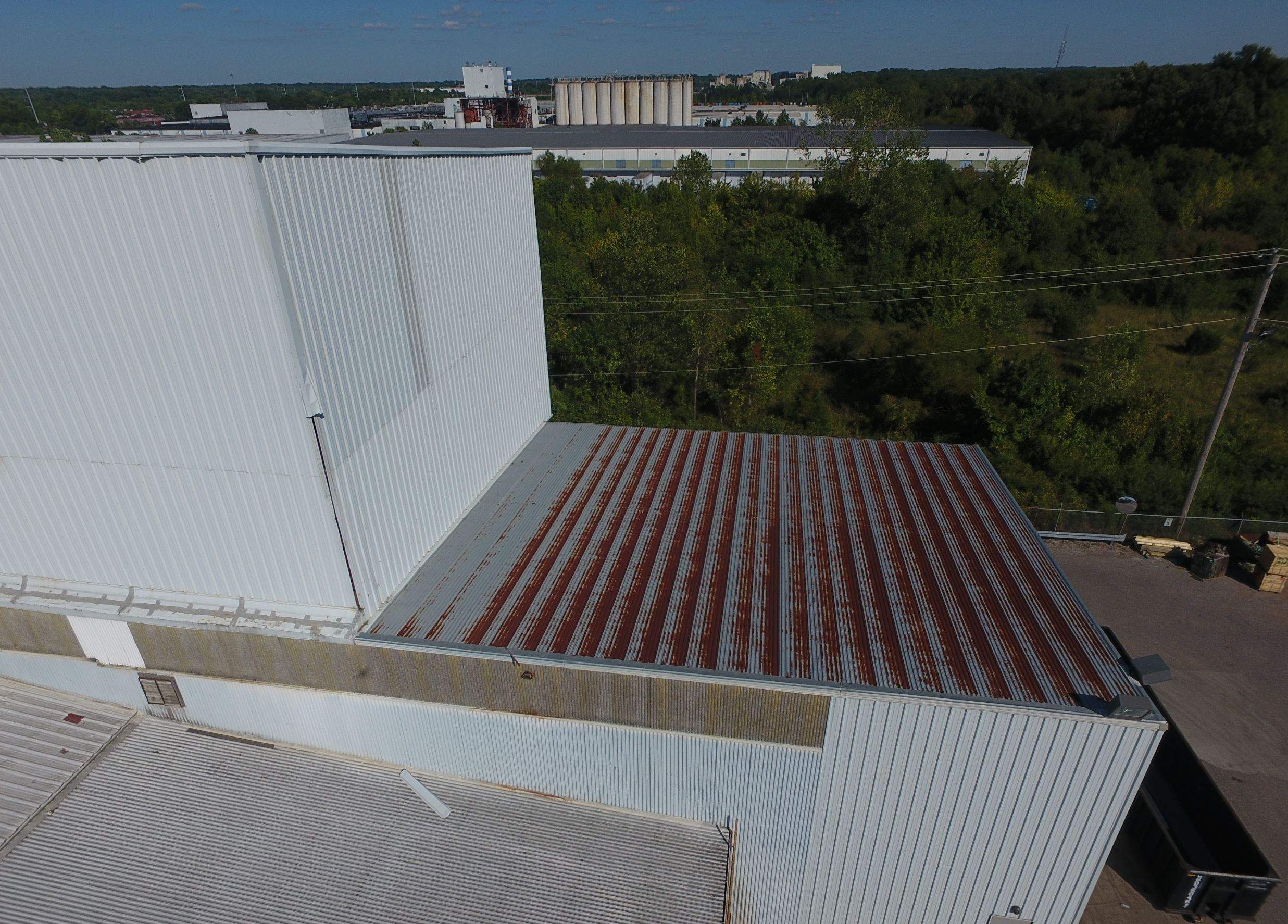 Commercial Metal Restoration System using Aldocoat Coatings by Hostetler Roofing