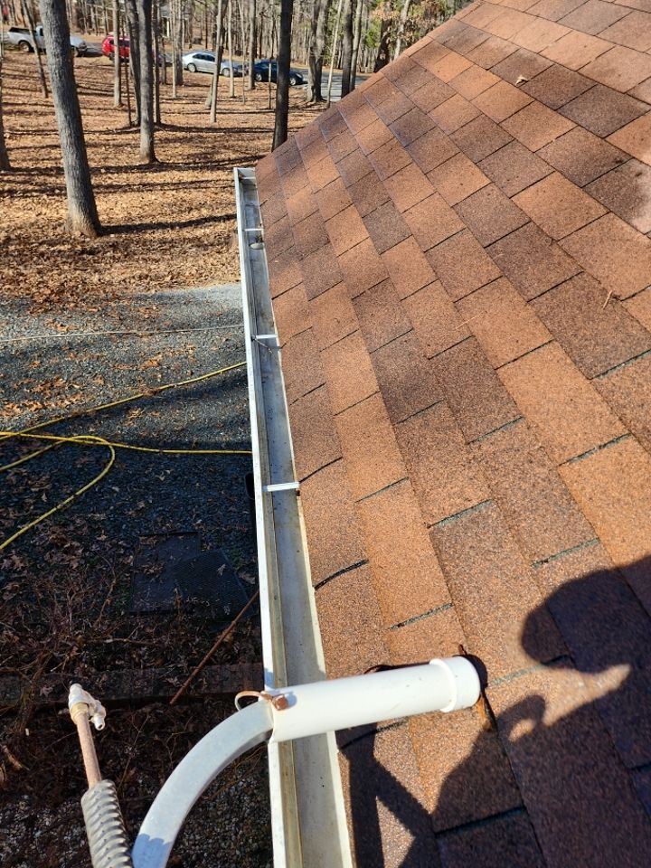 Gutter and Roof cleaning using cleaner by G&H Home Tech Pros LLC