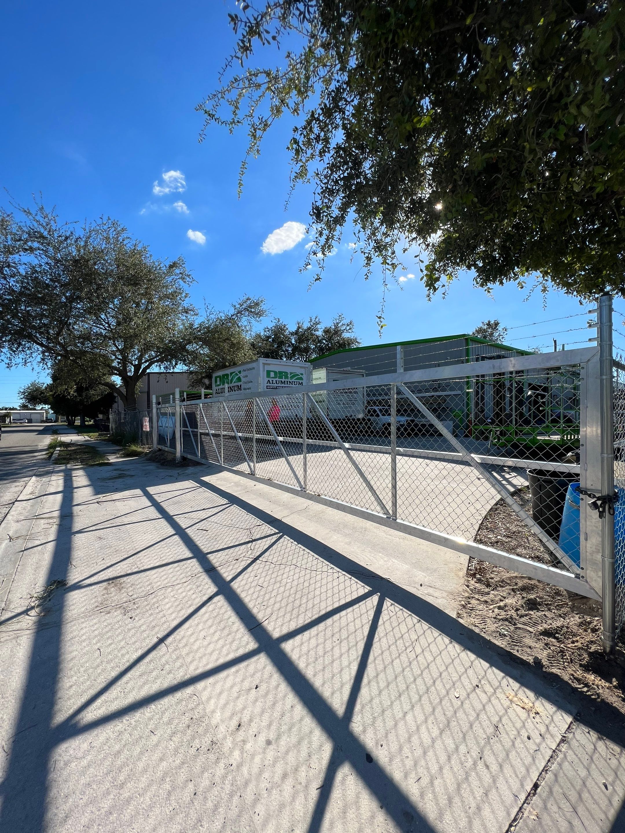 Commercial Fence Installation using Aluminum Estate Gate by Asap fence and gates, LLC
