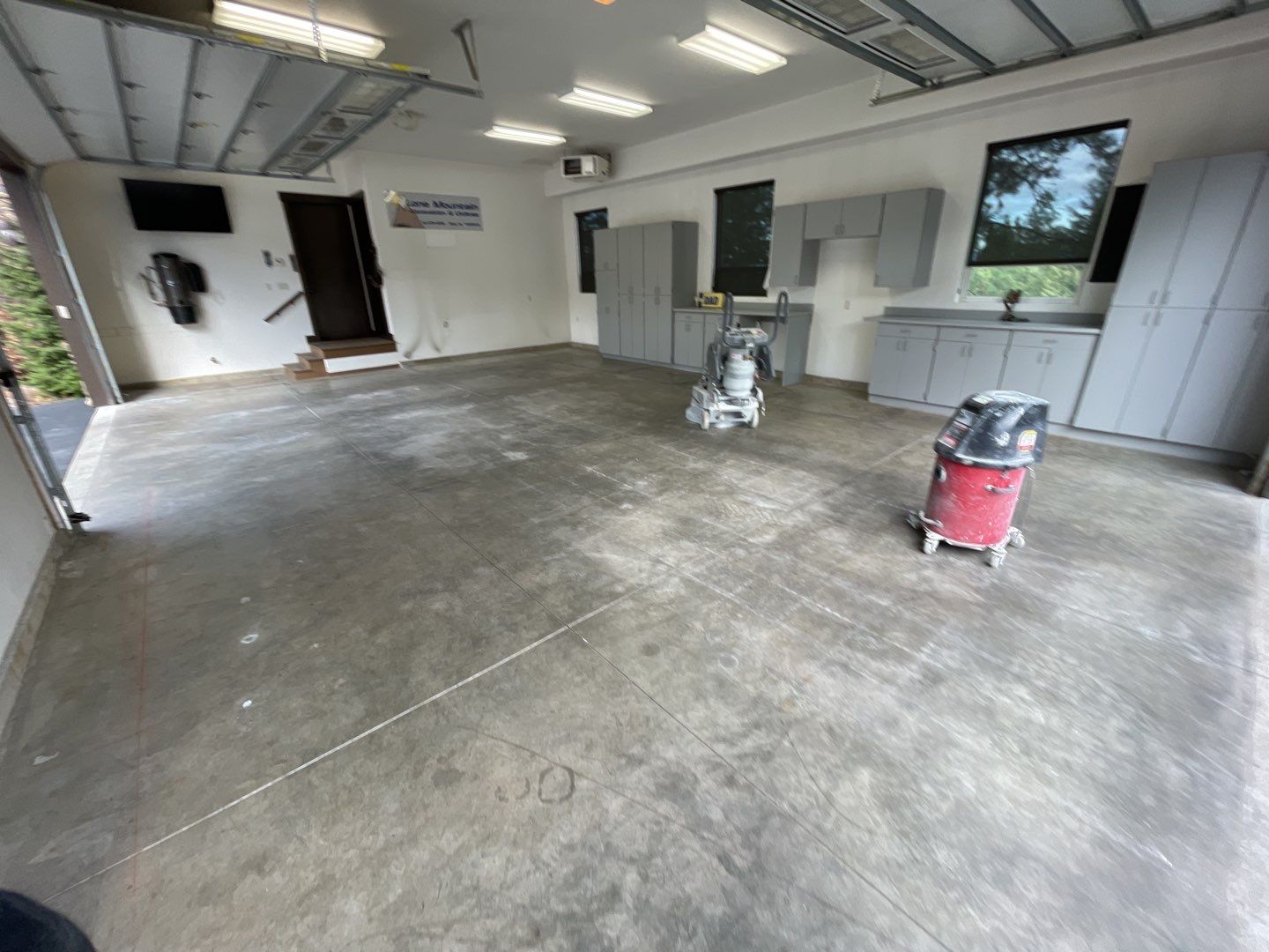 Garage Transformation using Smoke and the Penntek Evolution System by Croc Coatings, LLC