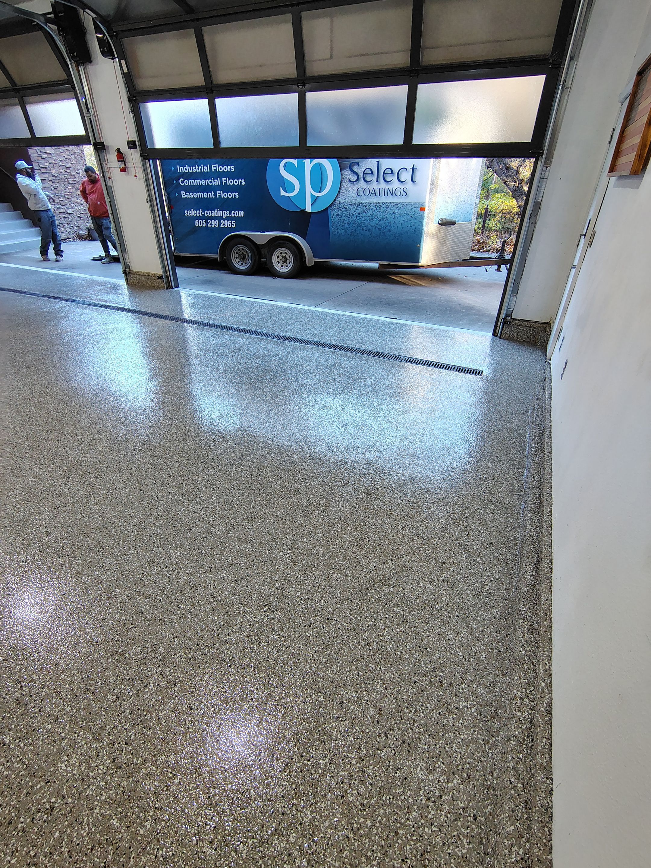Garage Floor and Entry Step Concrete Coating in Sioux Falls by Select Painting, Coatings & Garage Cabinets
