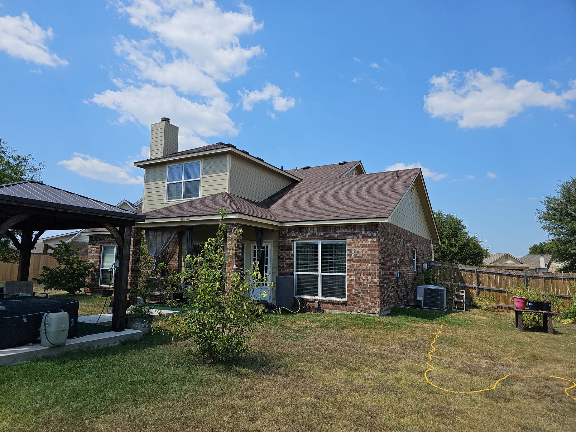 Residential Roofing Installation using Owens Corning Oakridge Brownwood by DeZign Roofing & Exteriors