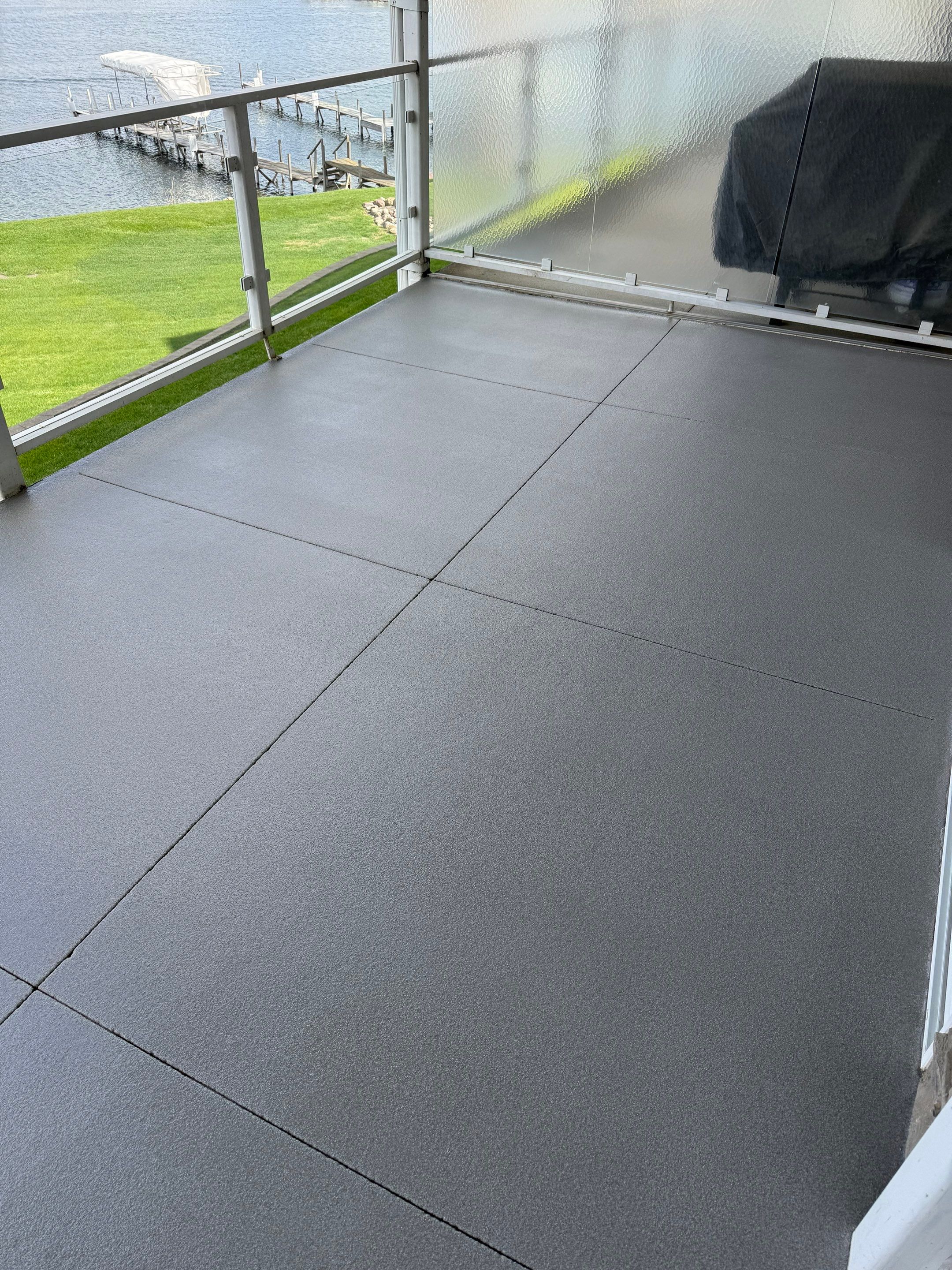 Dark Gray Slip-Resistant Concrete Coating for Arnolds Park Balcony by Select Painting, Coatings & Garage Cabinets