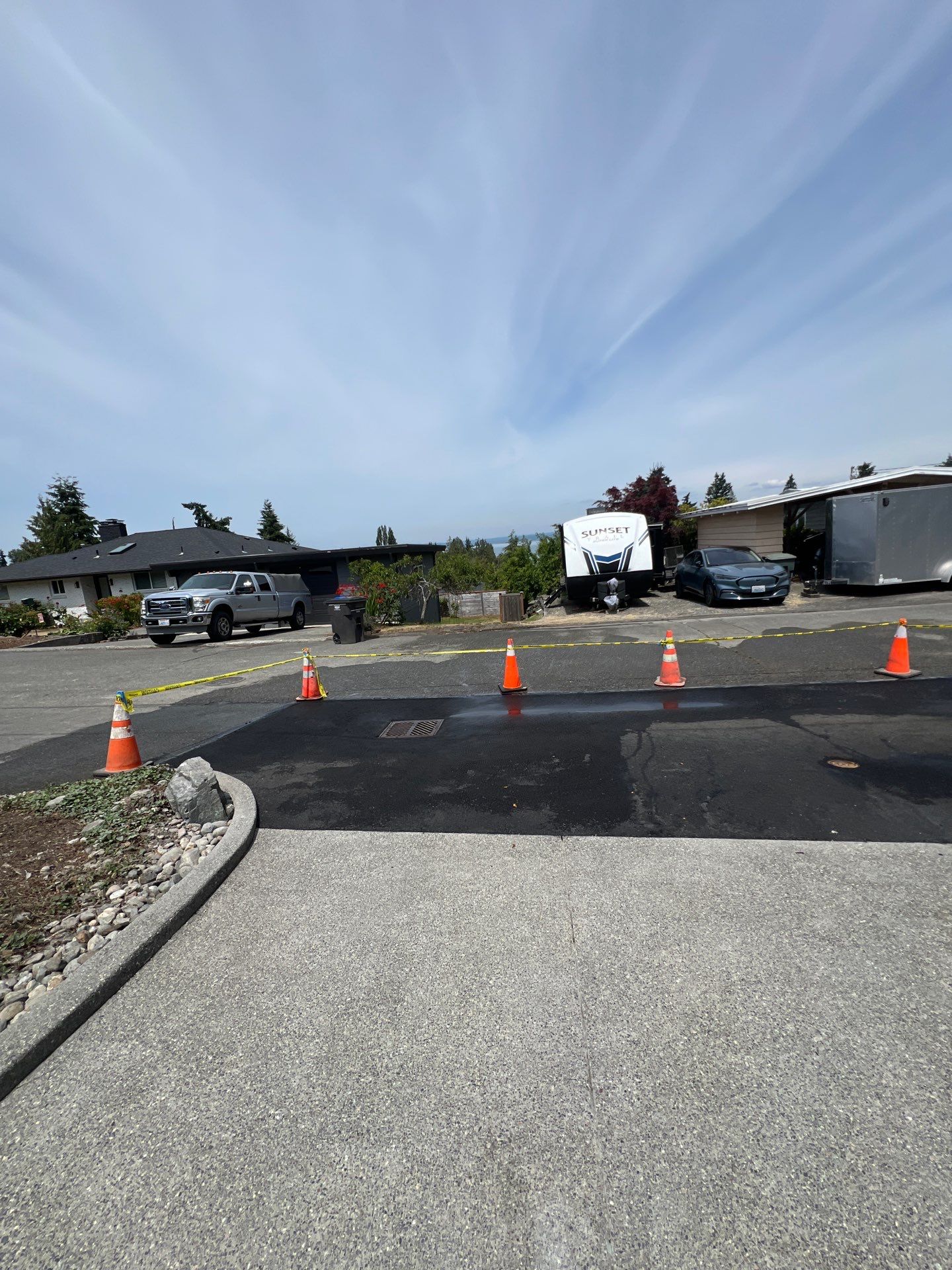Concrete Driveway Makeover w/ Asphalt Patch | Everett  by Jireh Asphalt & Concrete Inc 