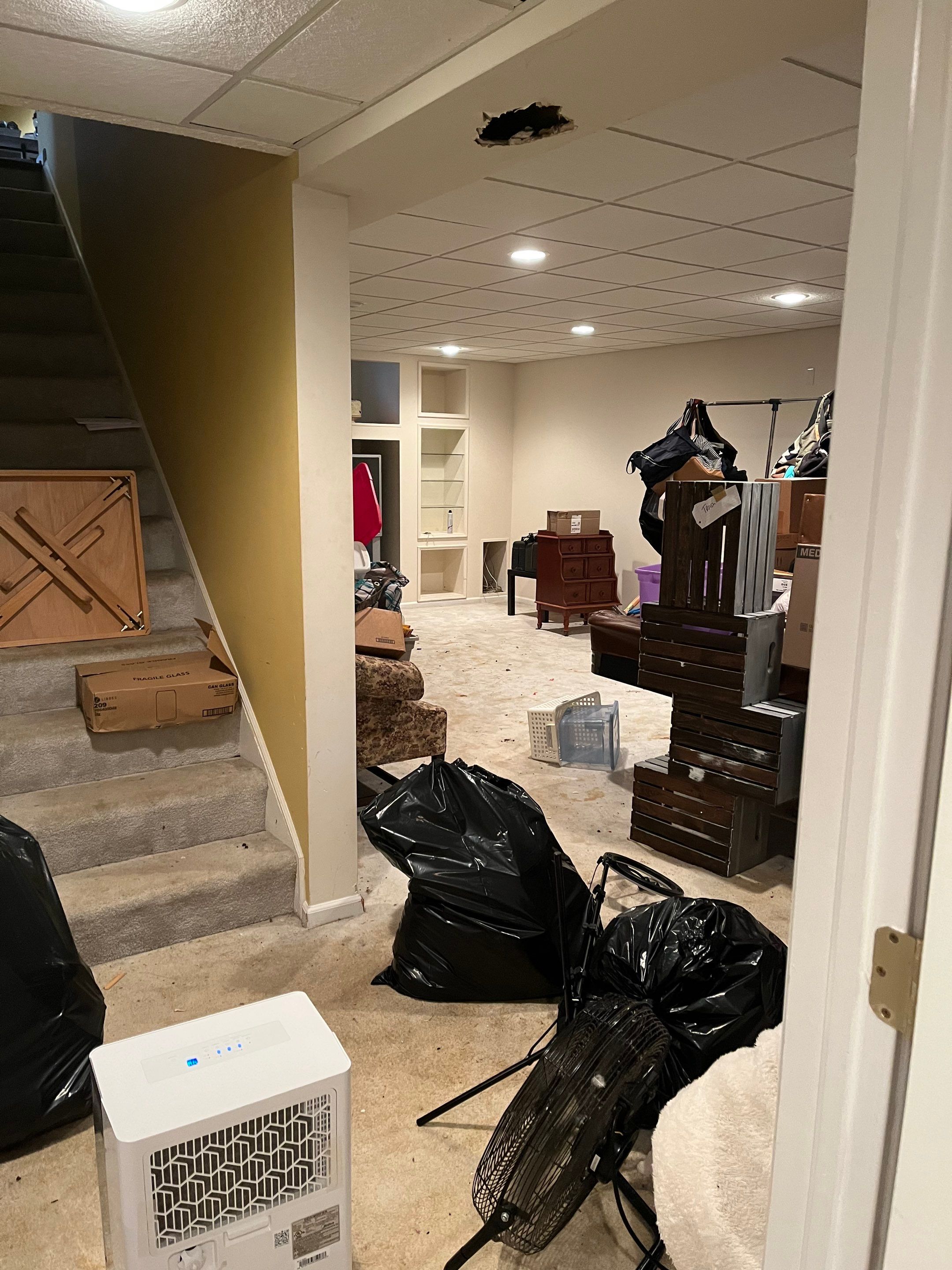 Basement Pipe Burst Emergency Mitigation Demo and Dry Down using Dehumidifiers and Air Movers by Absolute Roofing and Construction