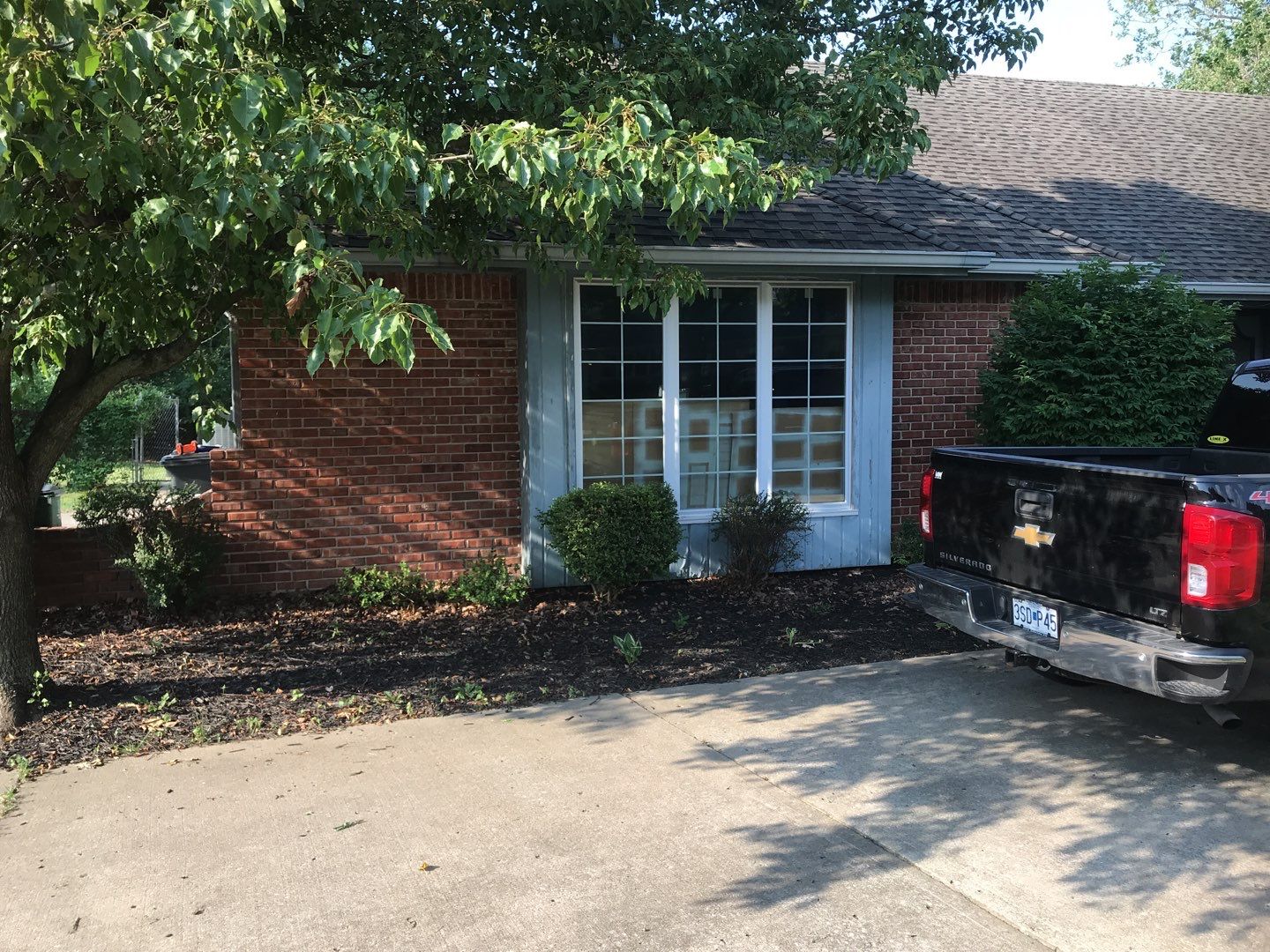 New white siding with Black trim by EEC  Windows, Siding & Roofing 