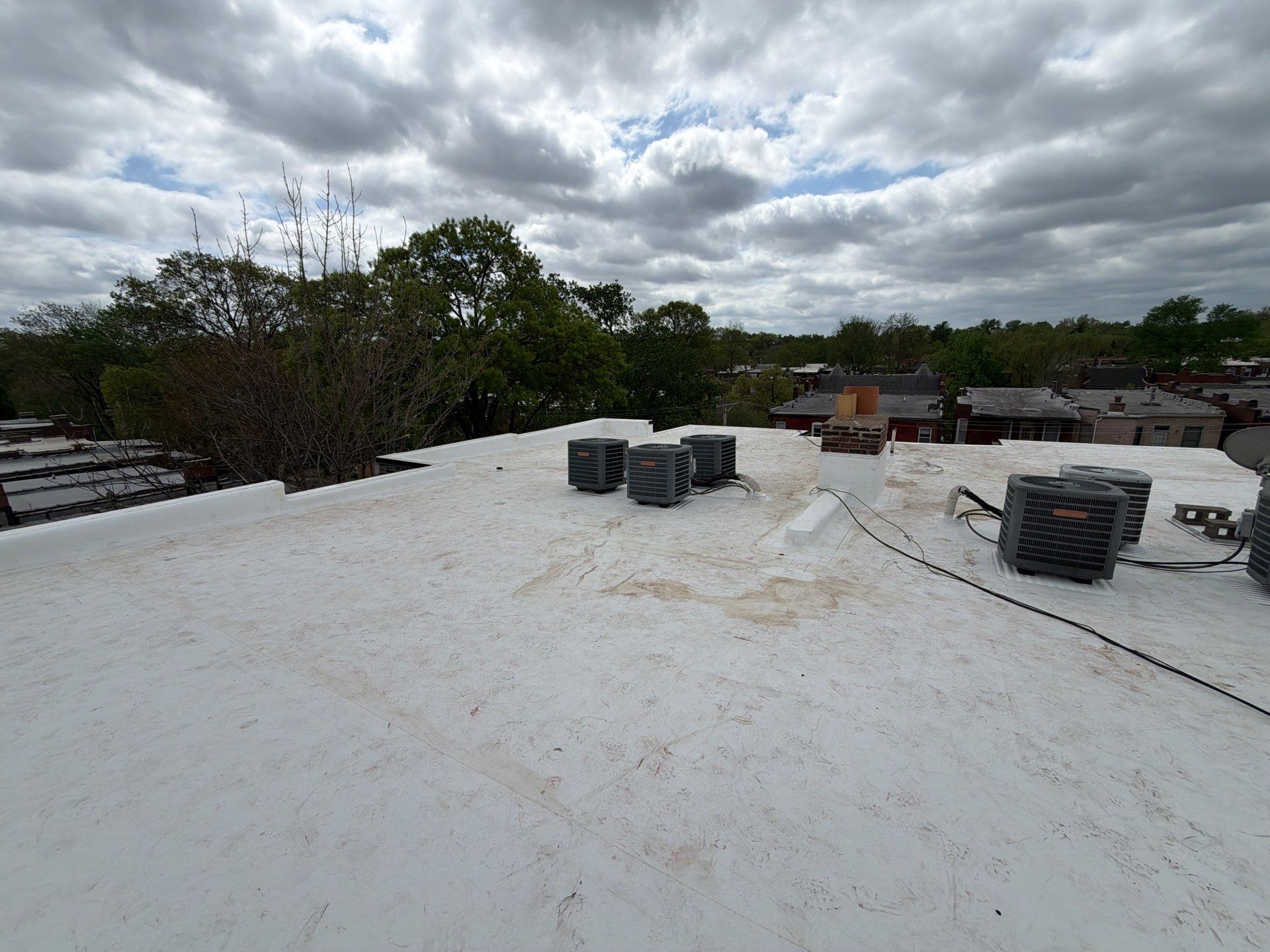 Multi-Family TPO Roof Installation and Masonry Repair in St. Louis by Acute Roofing And Exteriors