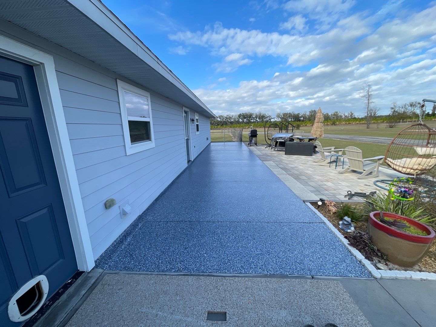 Patio in Trenton, FL in Denim by Cross Creek Concrete Coatings