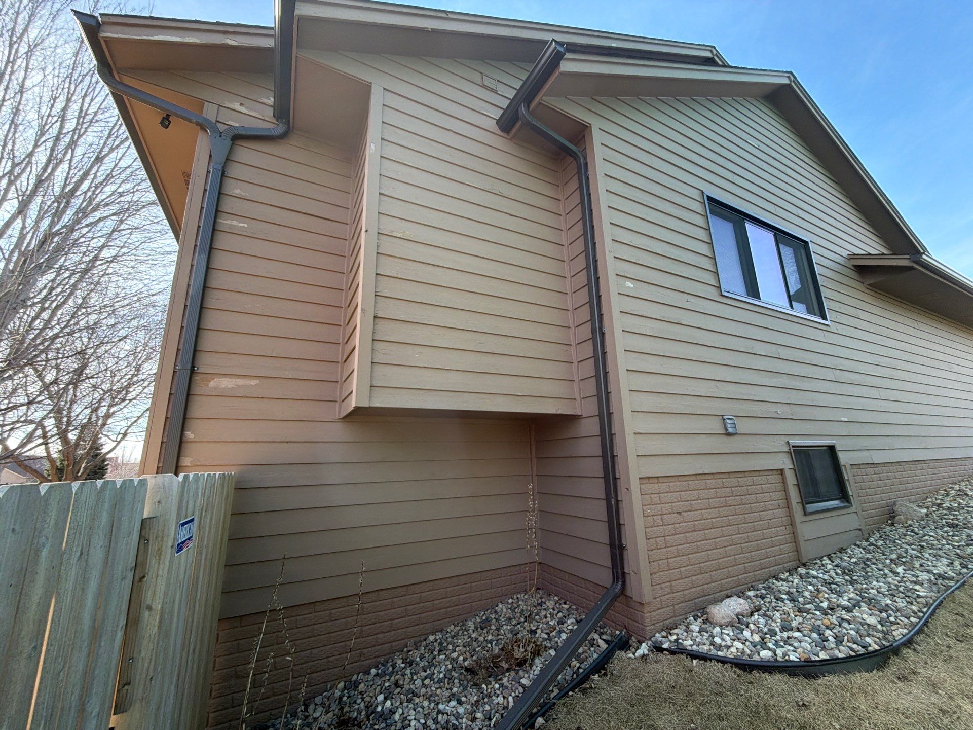 Wood Siding Restoration and Exterior Painting in Sioux Falls by Select Painting, Coatings & Garage Cabinets
