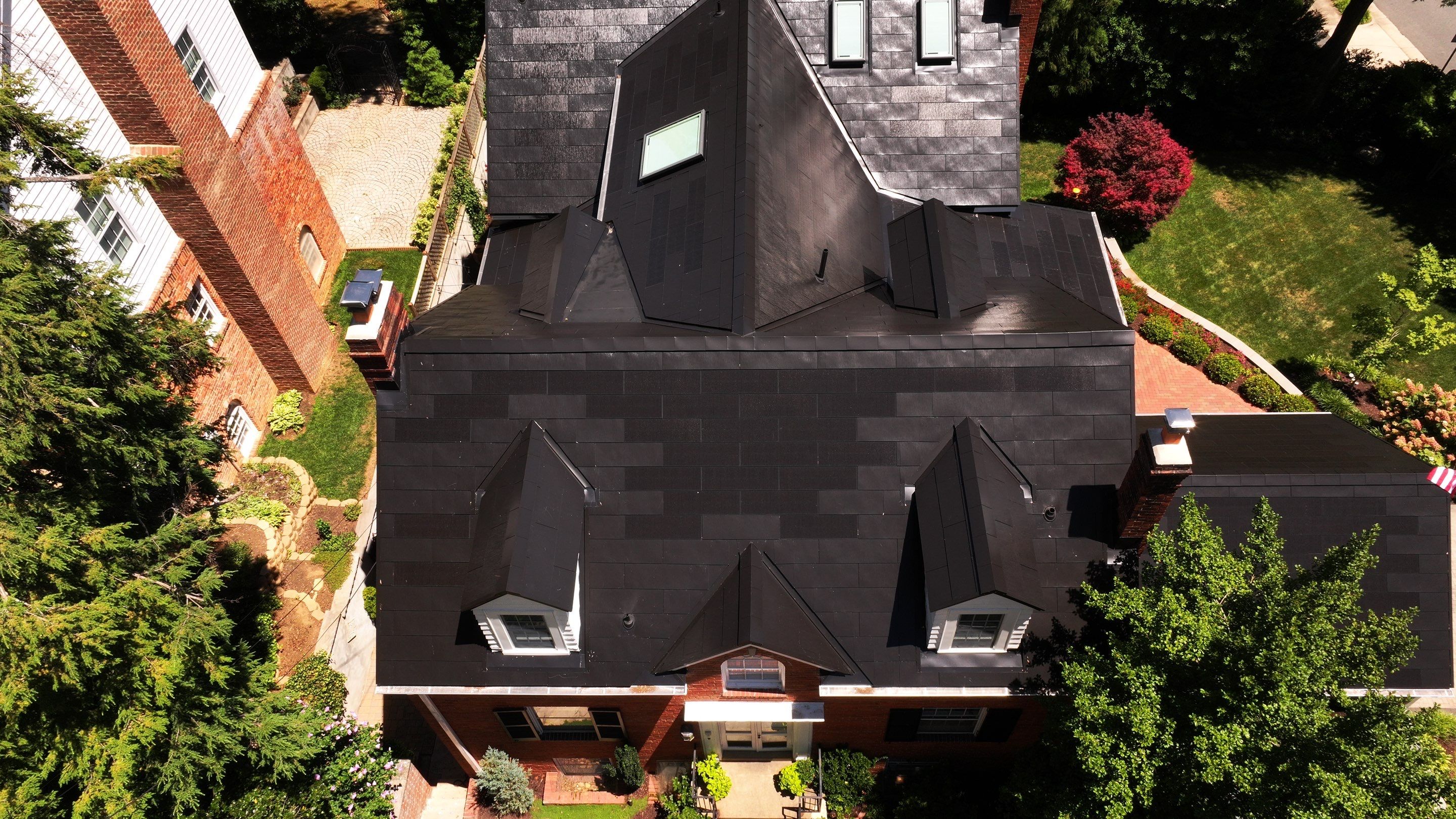 Sleek Tesla Solar Roof + Powerwall Installation | Alexandria, VA by American Home Contractors