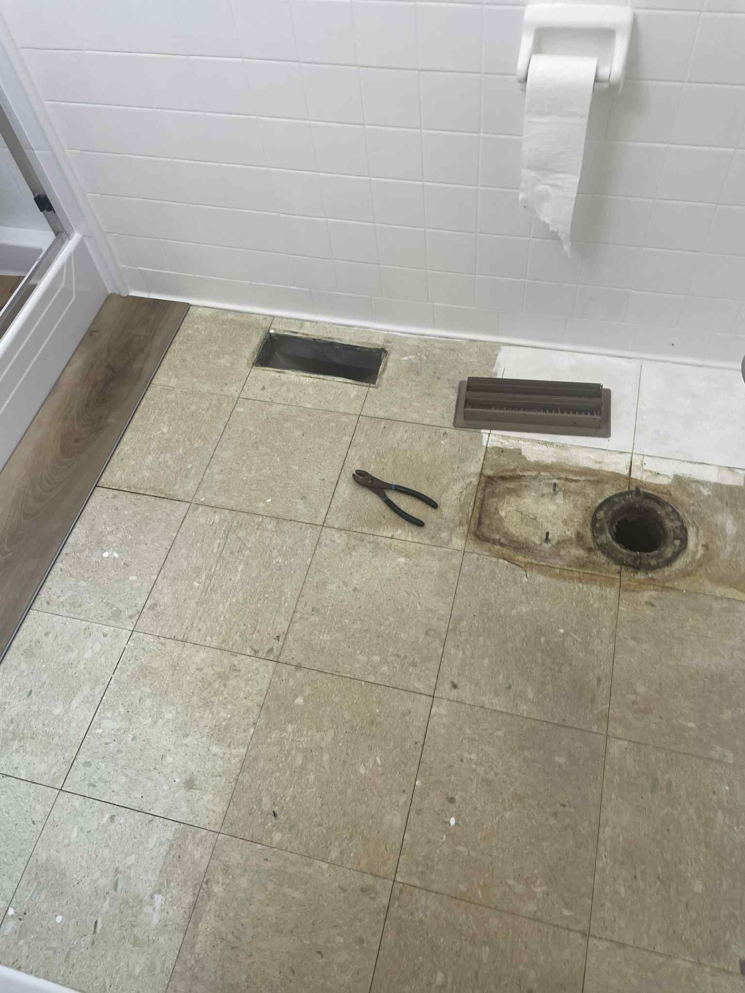 Bathroom Floor Installation by Axtra Hand