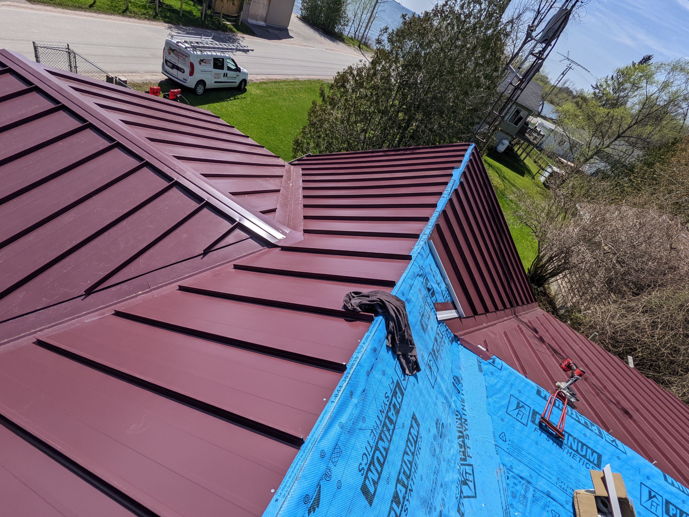 Residential Roofing Installation using 16" Standing Seam Panels by Jay Carter Roofing & Sheet Metal