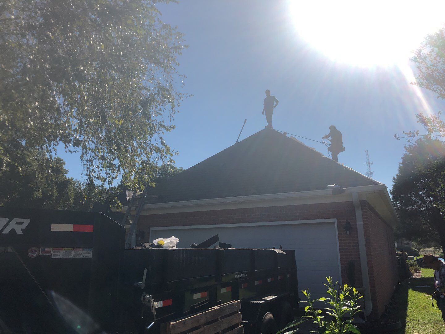 Residential Roofing Installation using Roof Replacement by American Roofing & Construction LLC