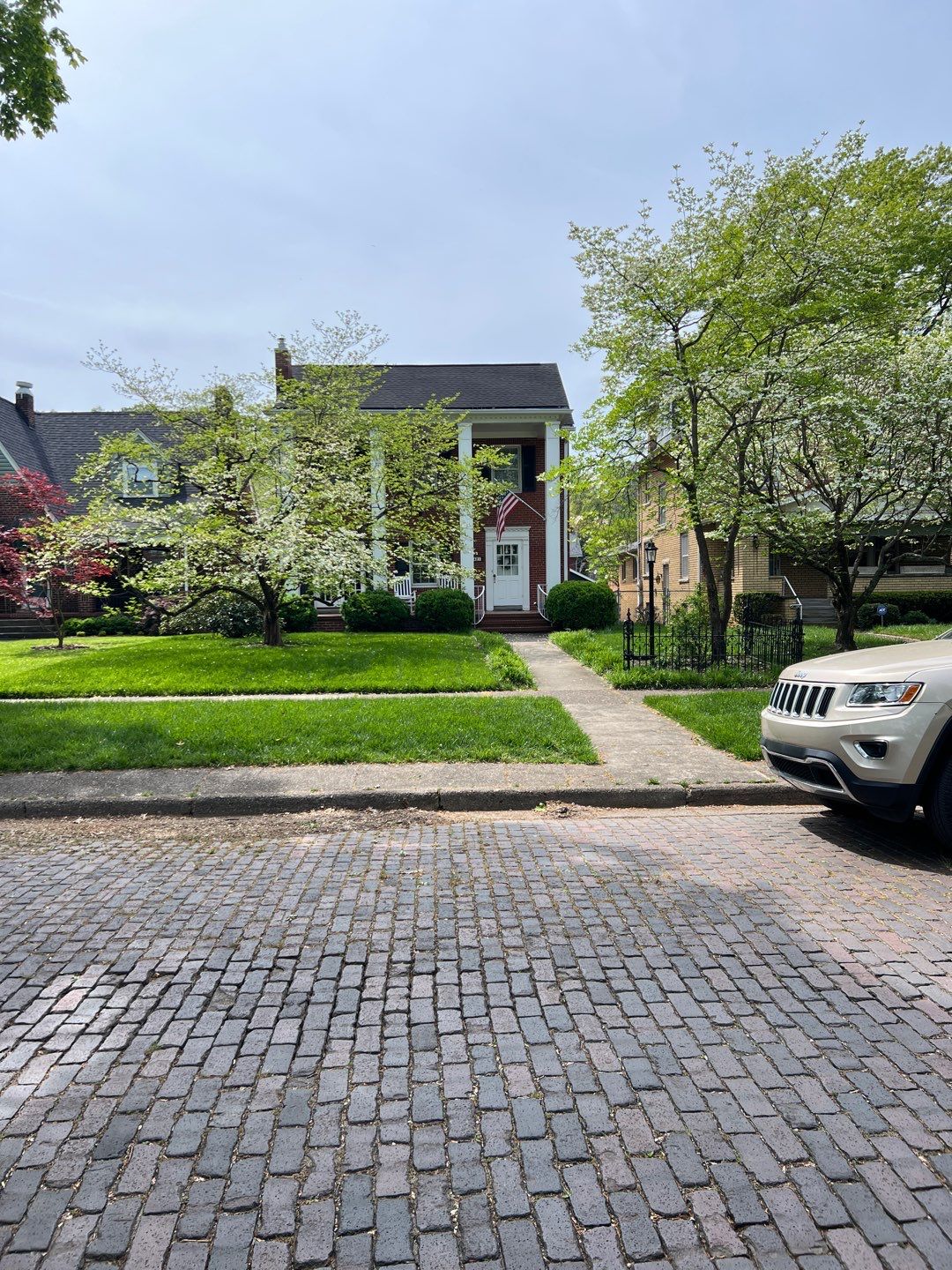 Liriope grasses, mulch and stone pavers by GrassBusters, Inc.
